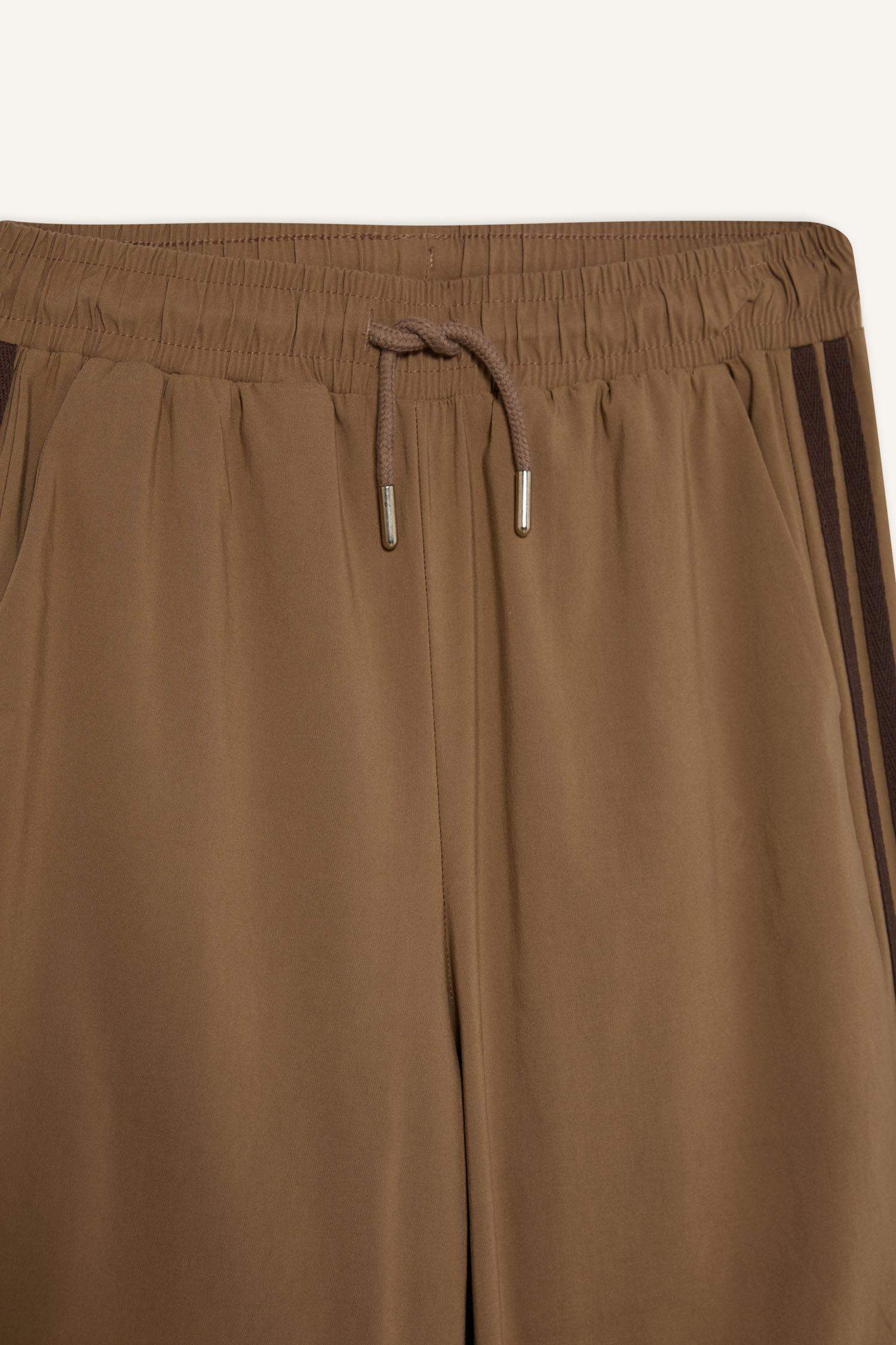 Coool Beli Lastikli Paçası Ayarlanabilir Lastikli Paraşüt Kumaş Pantolon