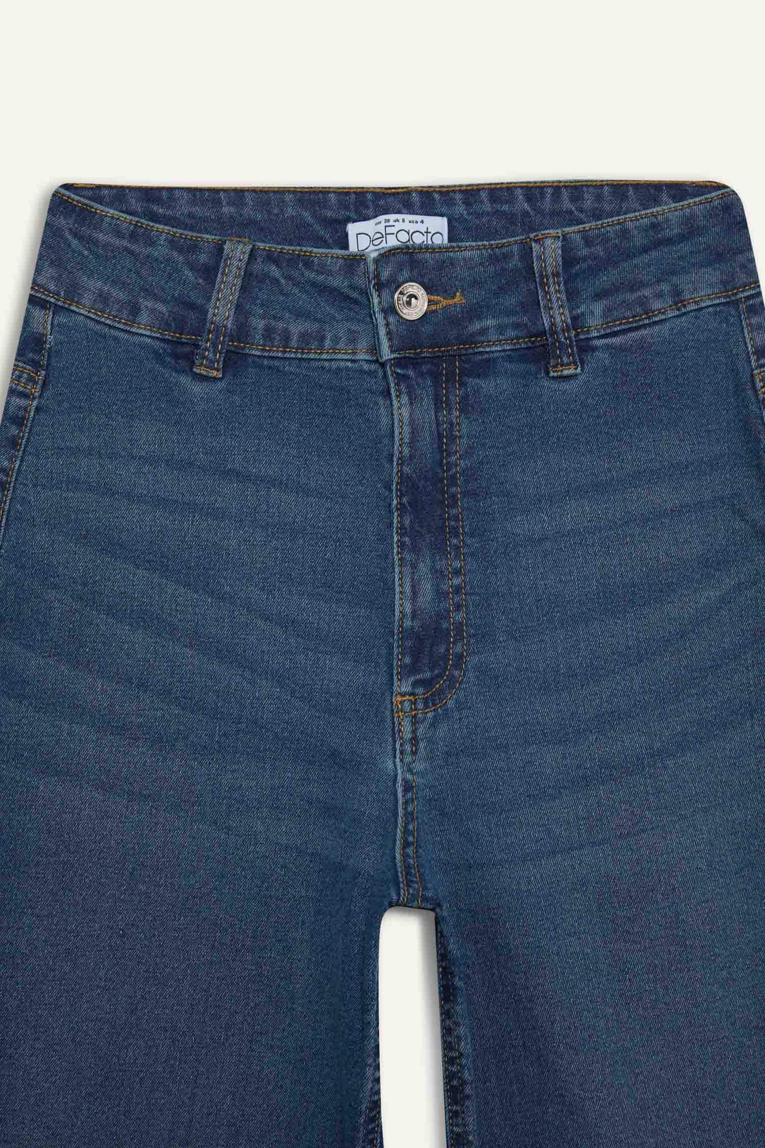 بنطلون جينز كولوت فيت برجل عادية وخصر عالي