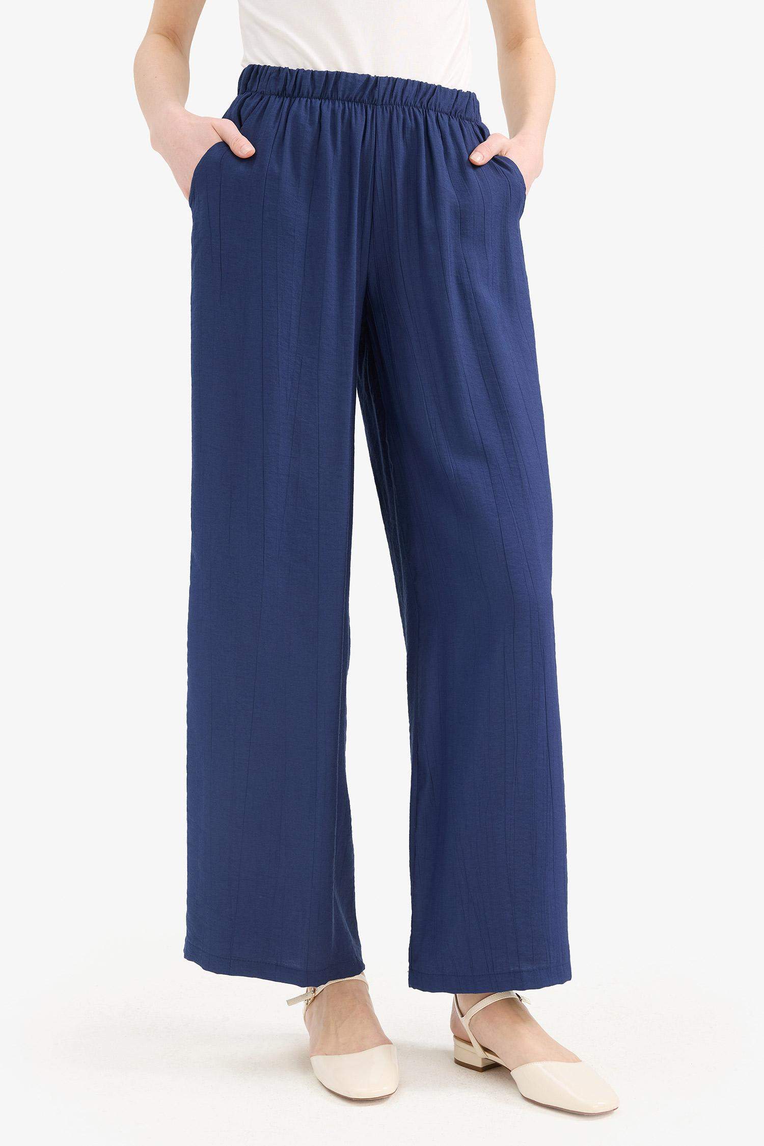 Pantalon large en tissu froissé