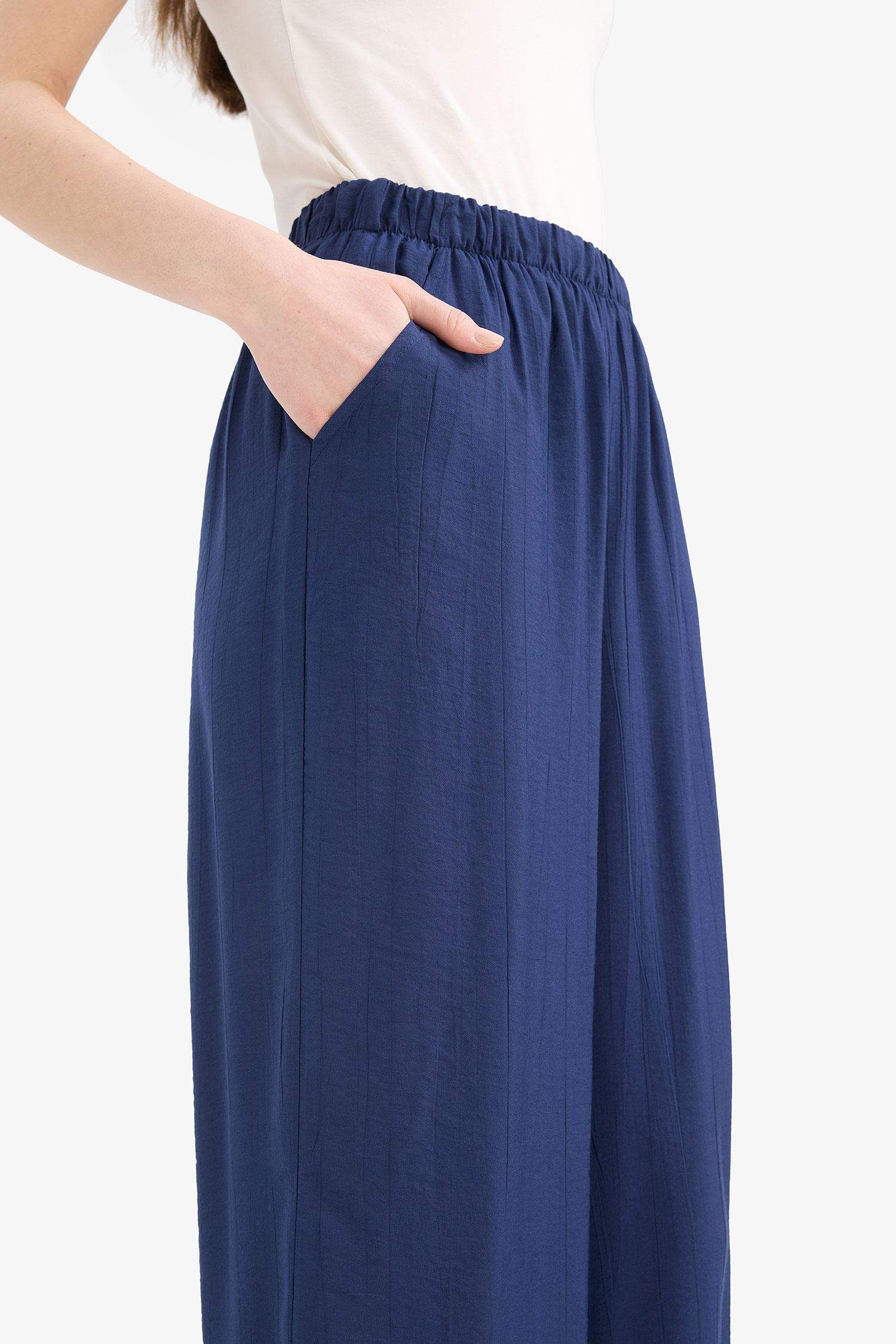 Pantalon large en tissu froissé