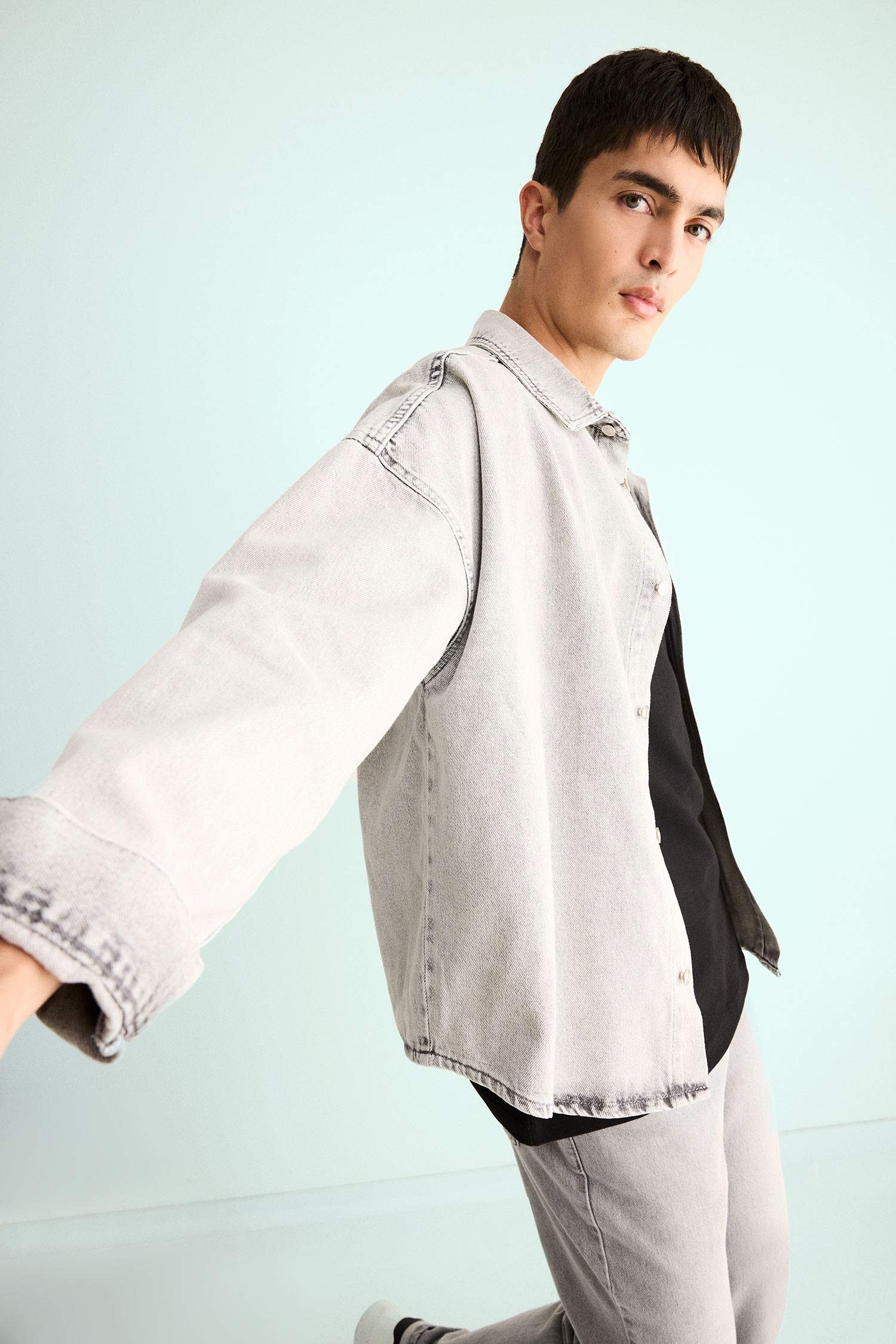 قميص جينز اوفر سايز كم طويل