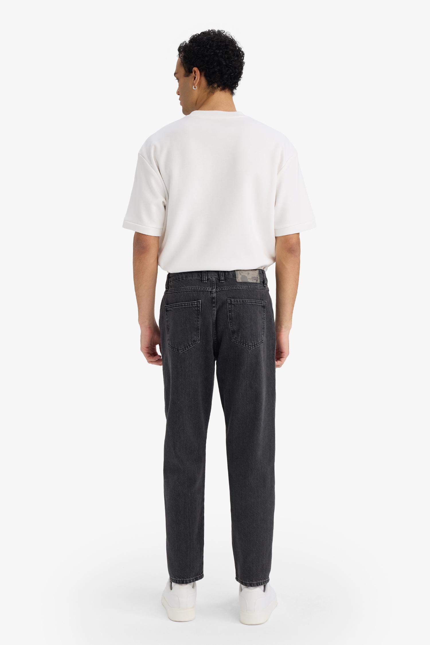 سروال جينز 90’S سليم فيت بساق ضيق