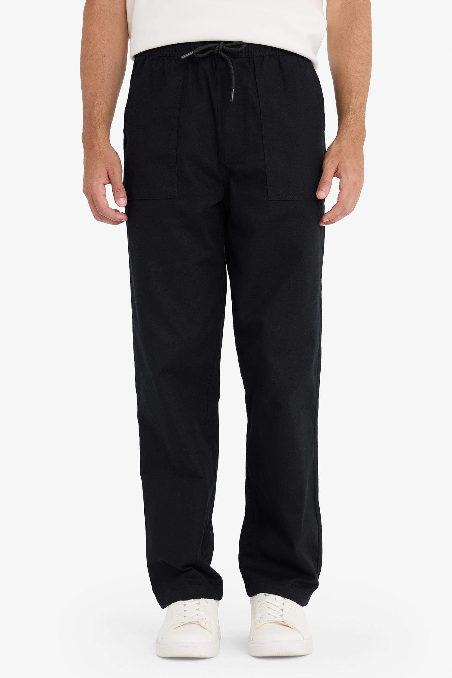 Широкие брюки из габардина с накладными карманами и прямыми штанинами