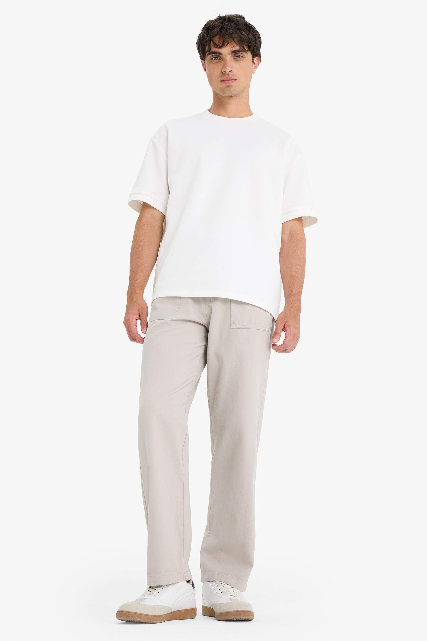 Широкие брюки из габардина с накладными карманами и прямыми штанинами