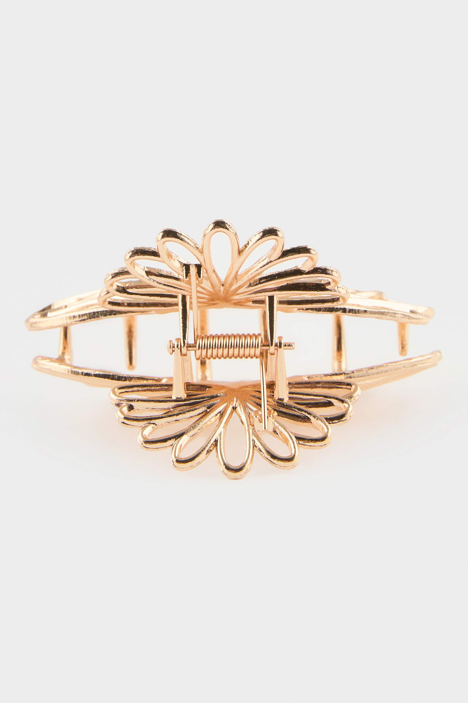 مشبك شعر نسائي ذهبي