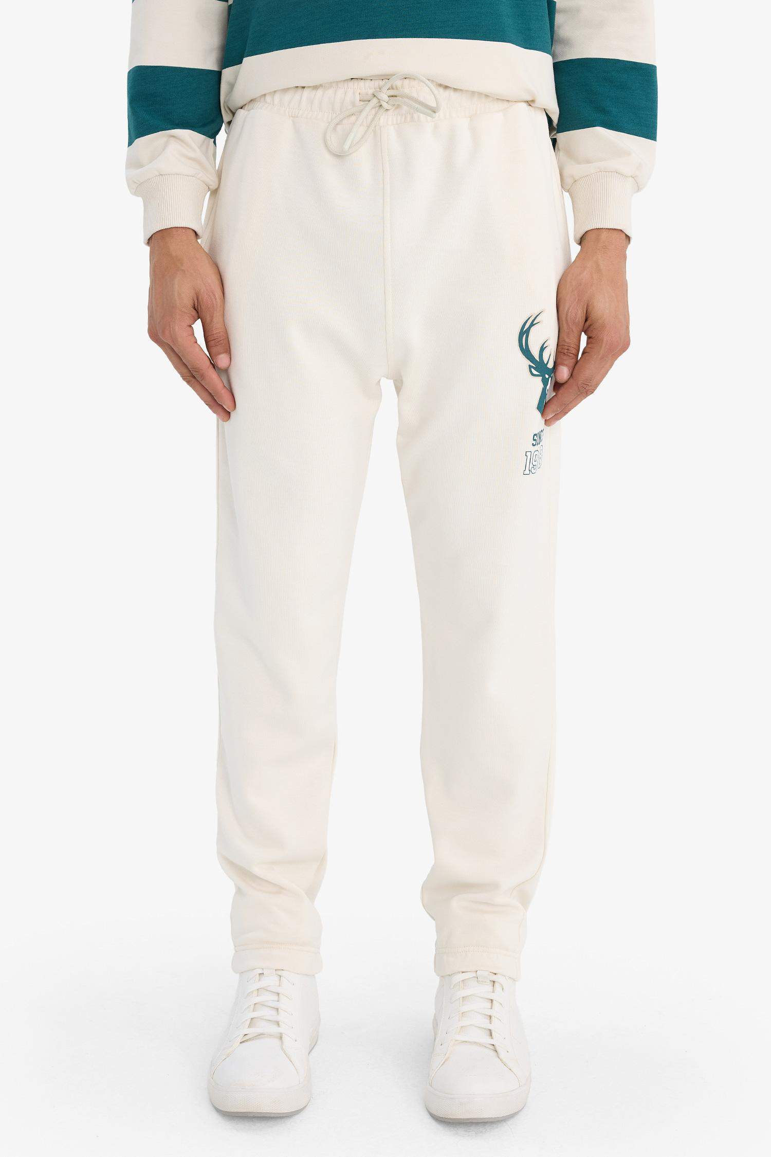 Standard Fit NBA Milwaukee Bucks Licensed Thick Sweatshirt Fabric Elastic Band Jogger