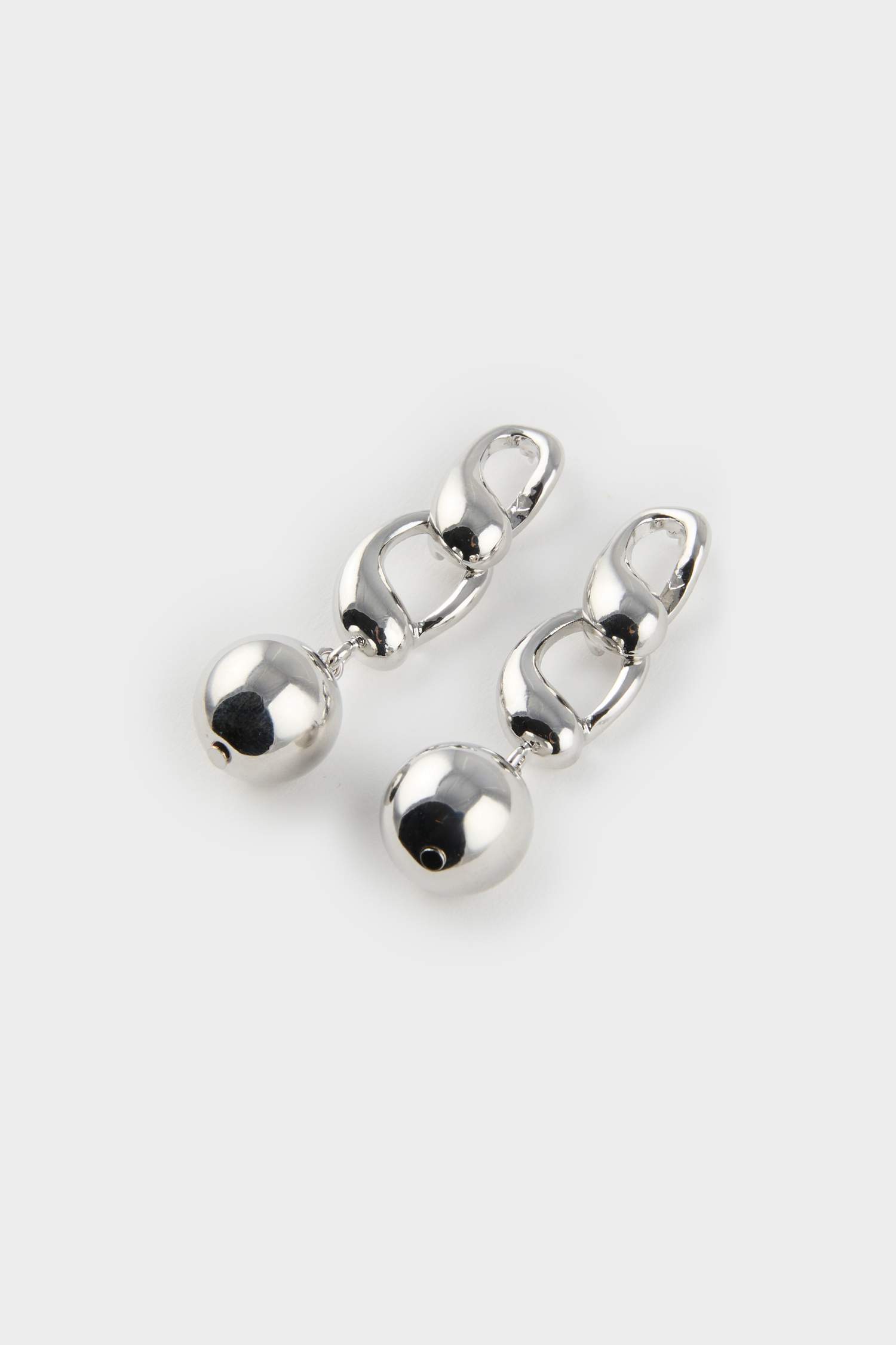 تراجي نسائي فضي