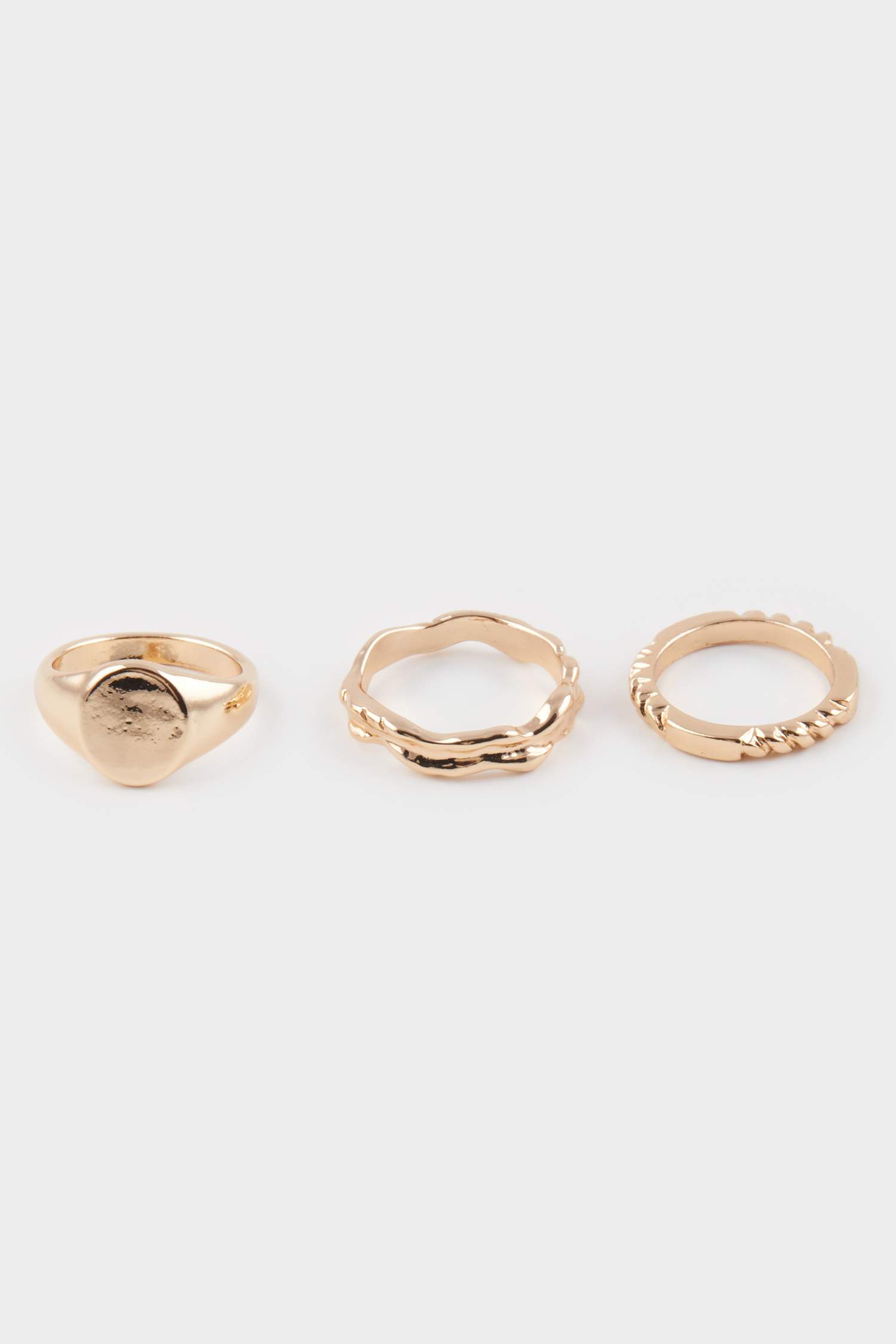 Woman 3 Piece Gold Rings