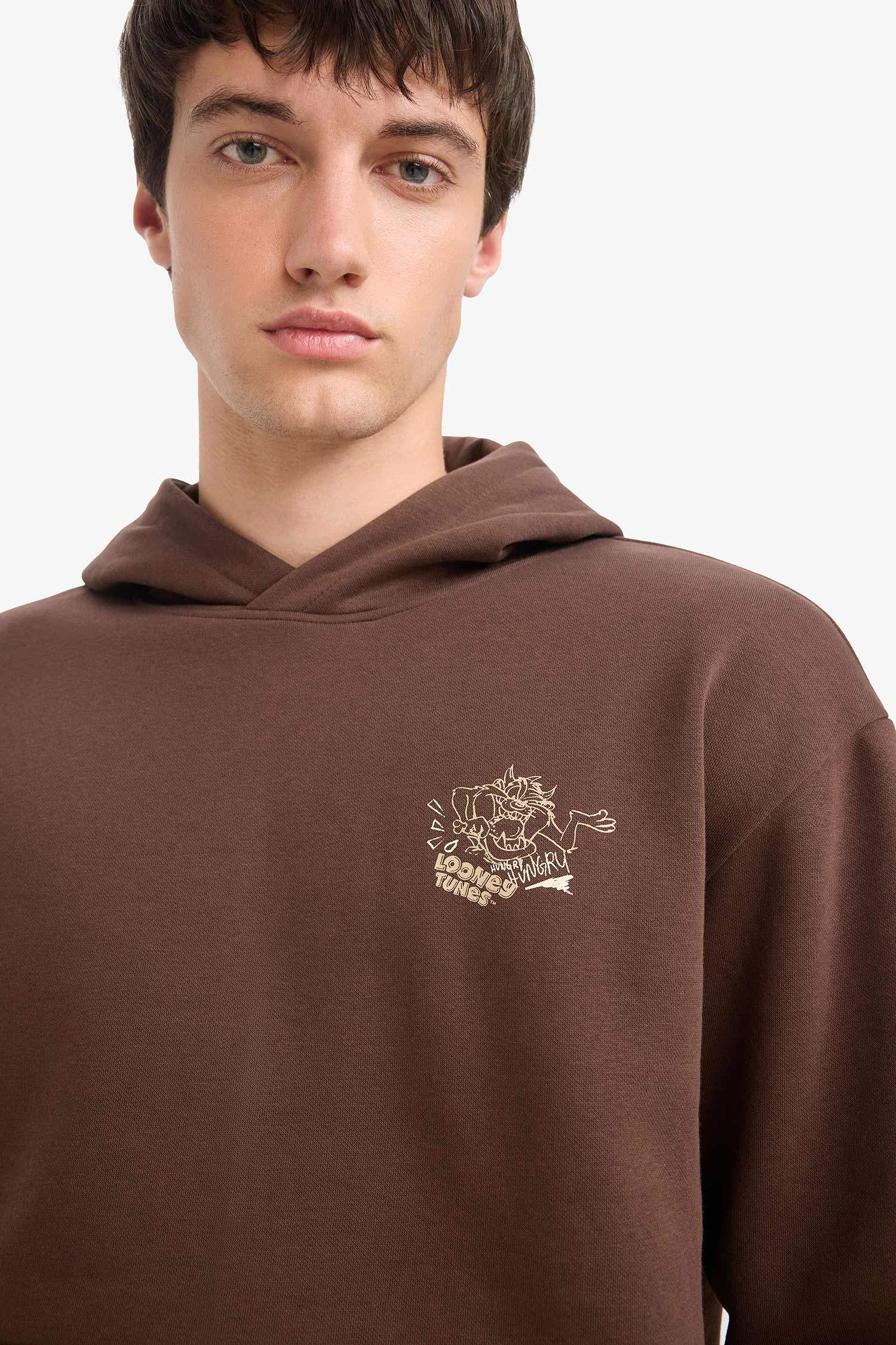 سويت شيرت مطبوع أوفر سايز بكابيشون من لوني تونز