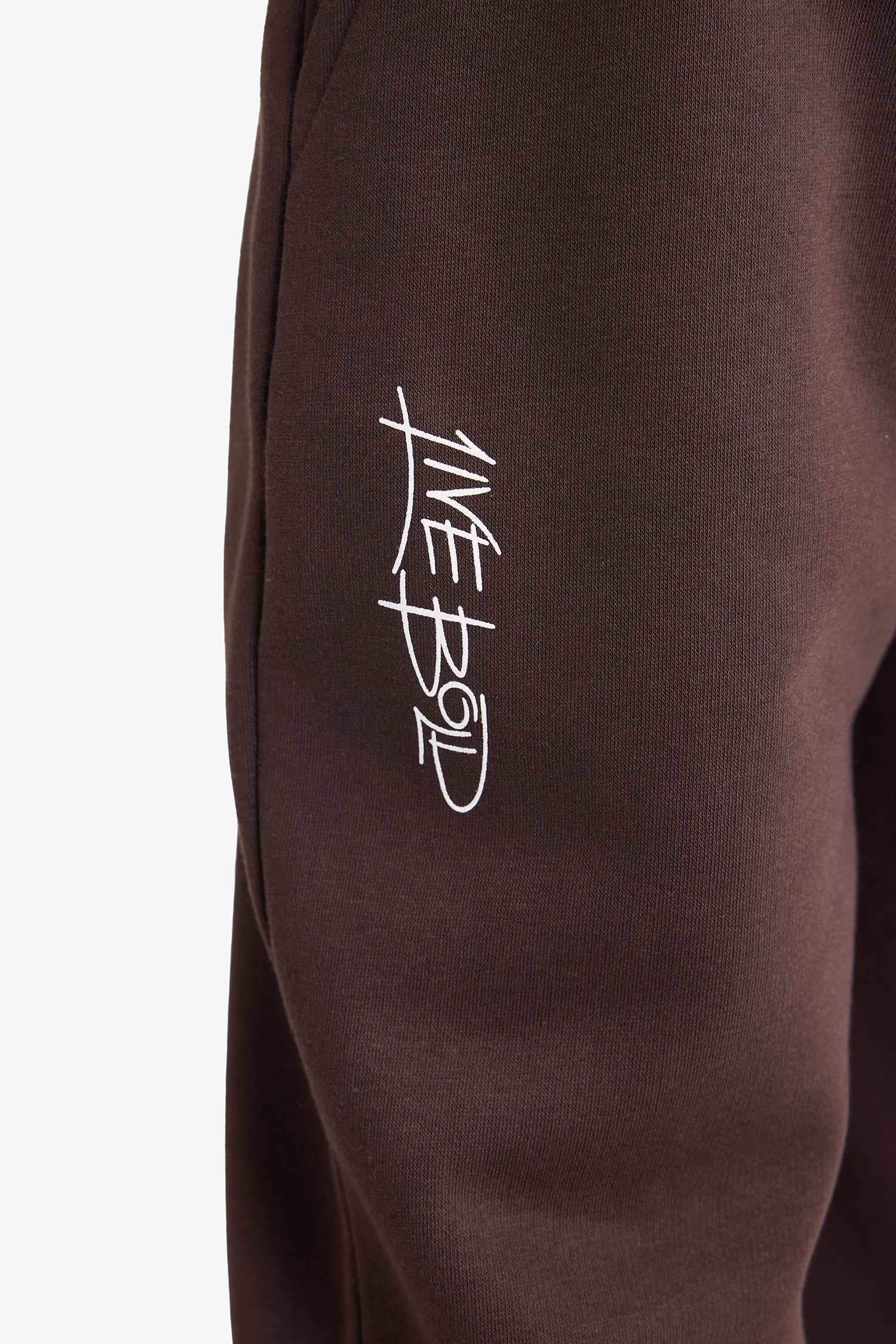 سروال بطبعة شعار قماش سميك قصة عادية