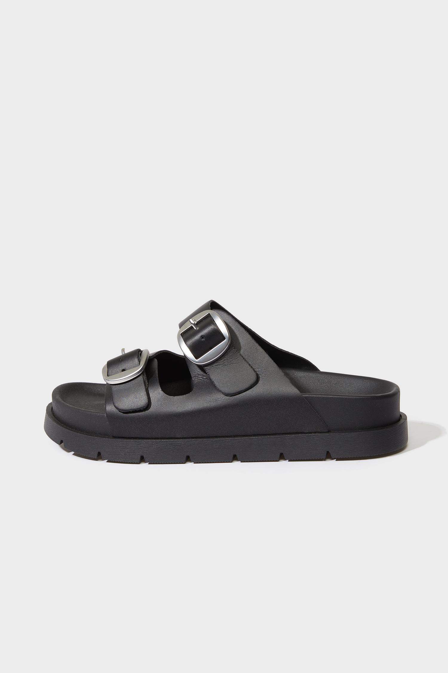 صندل نسائي من جلد صناعي بكعب مسطح بشريط مزدوج