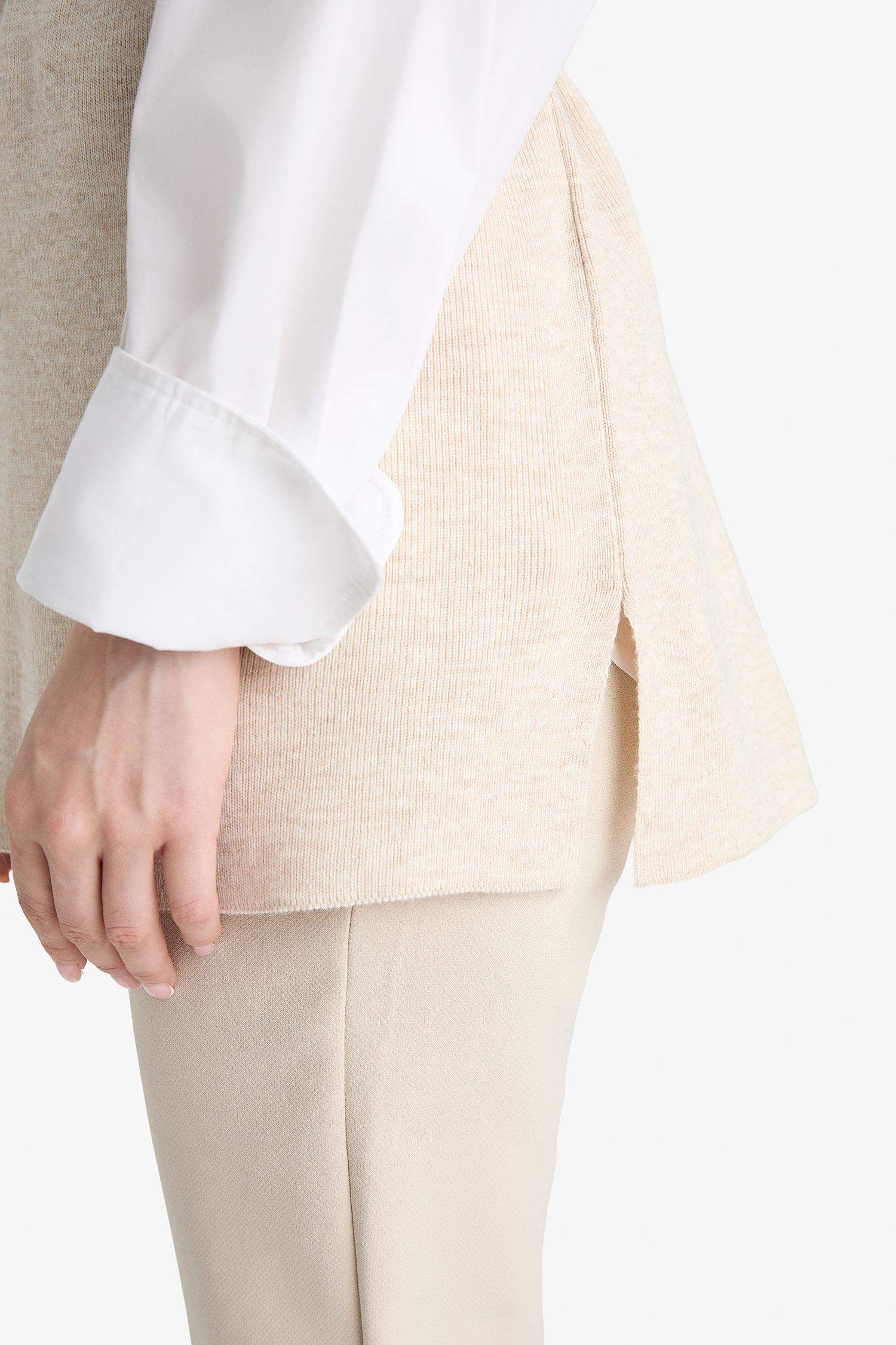 Pull sans manches en maille à col rond avec ceinture