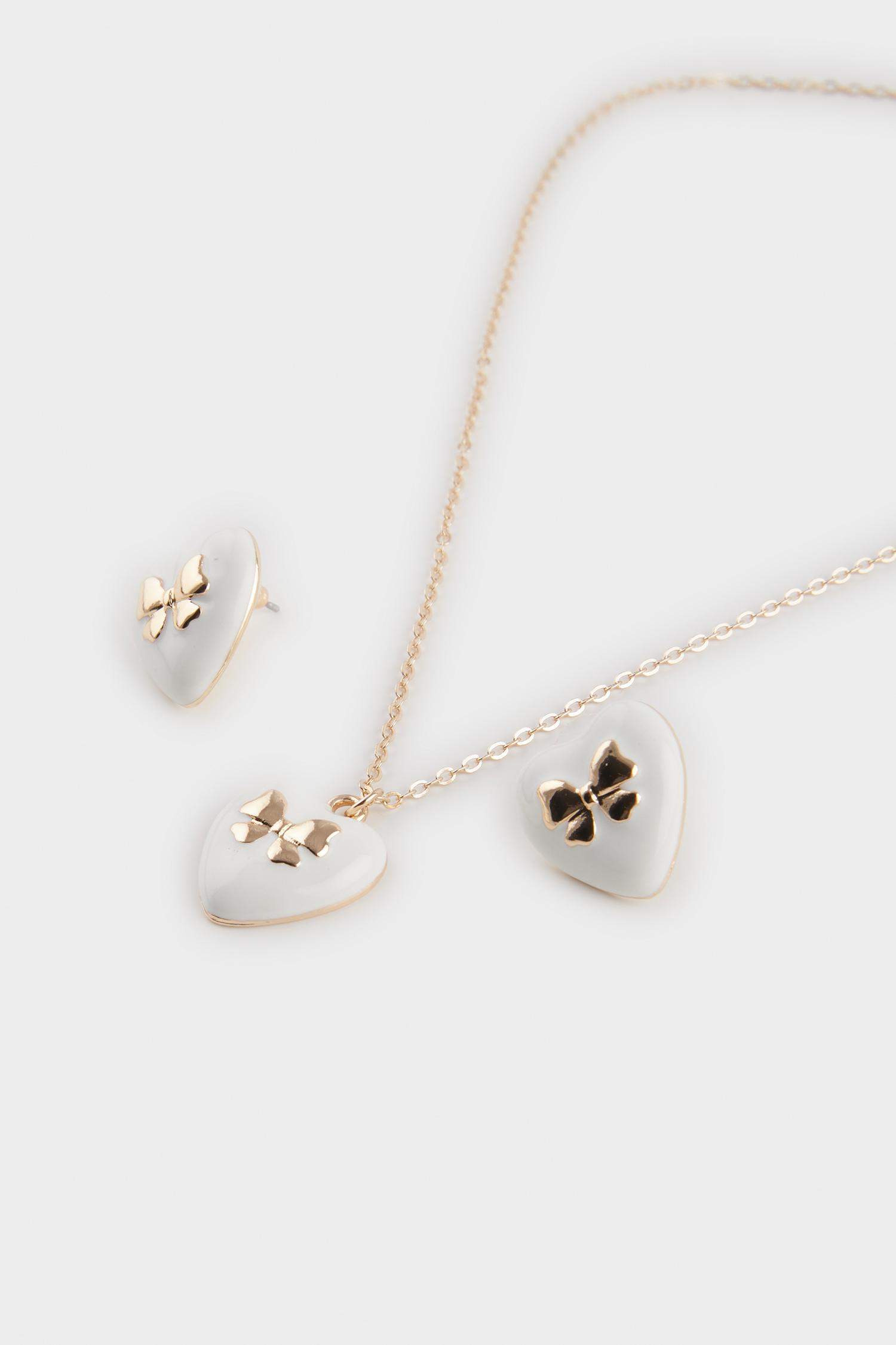 سيت نسائي تراجي وقلادة باحجار ابيض