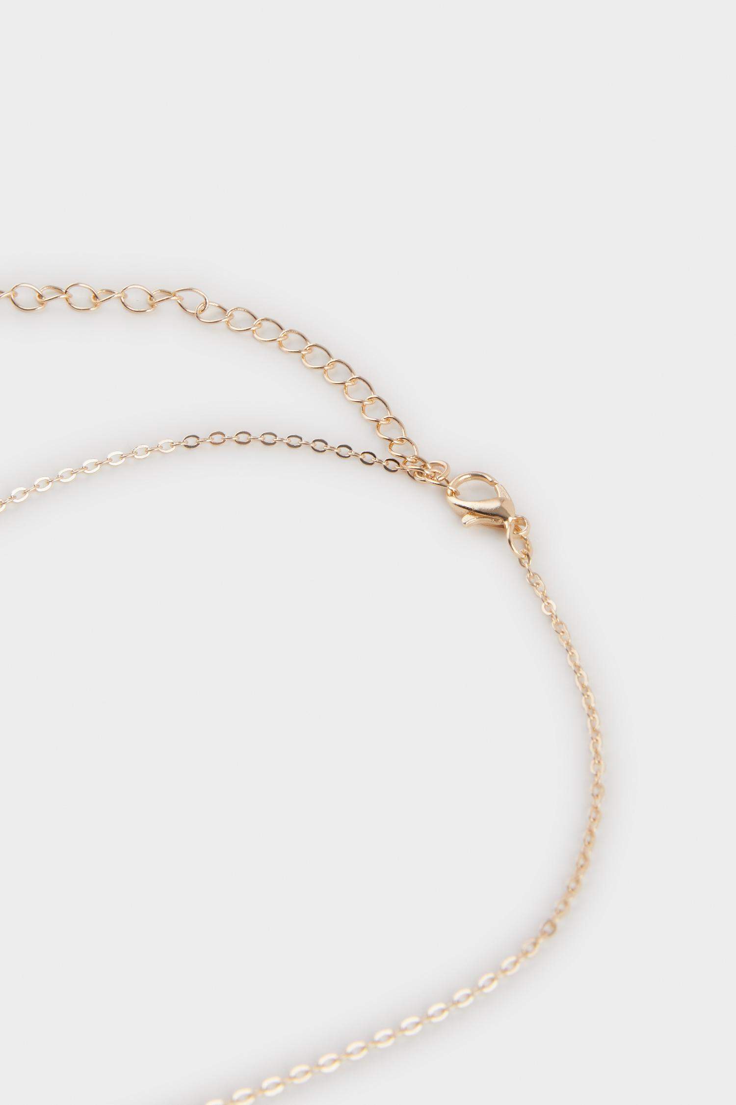 سيت نسائي تراجي وقلادة باحجار ابيض