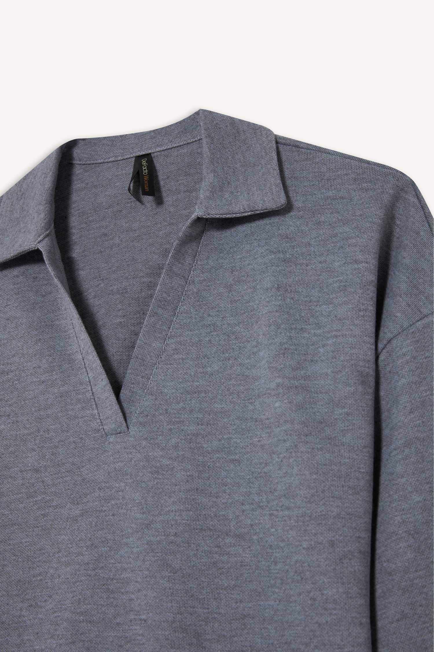 سويت شيرت مضلع قصة مريحة بياخة بولو