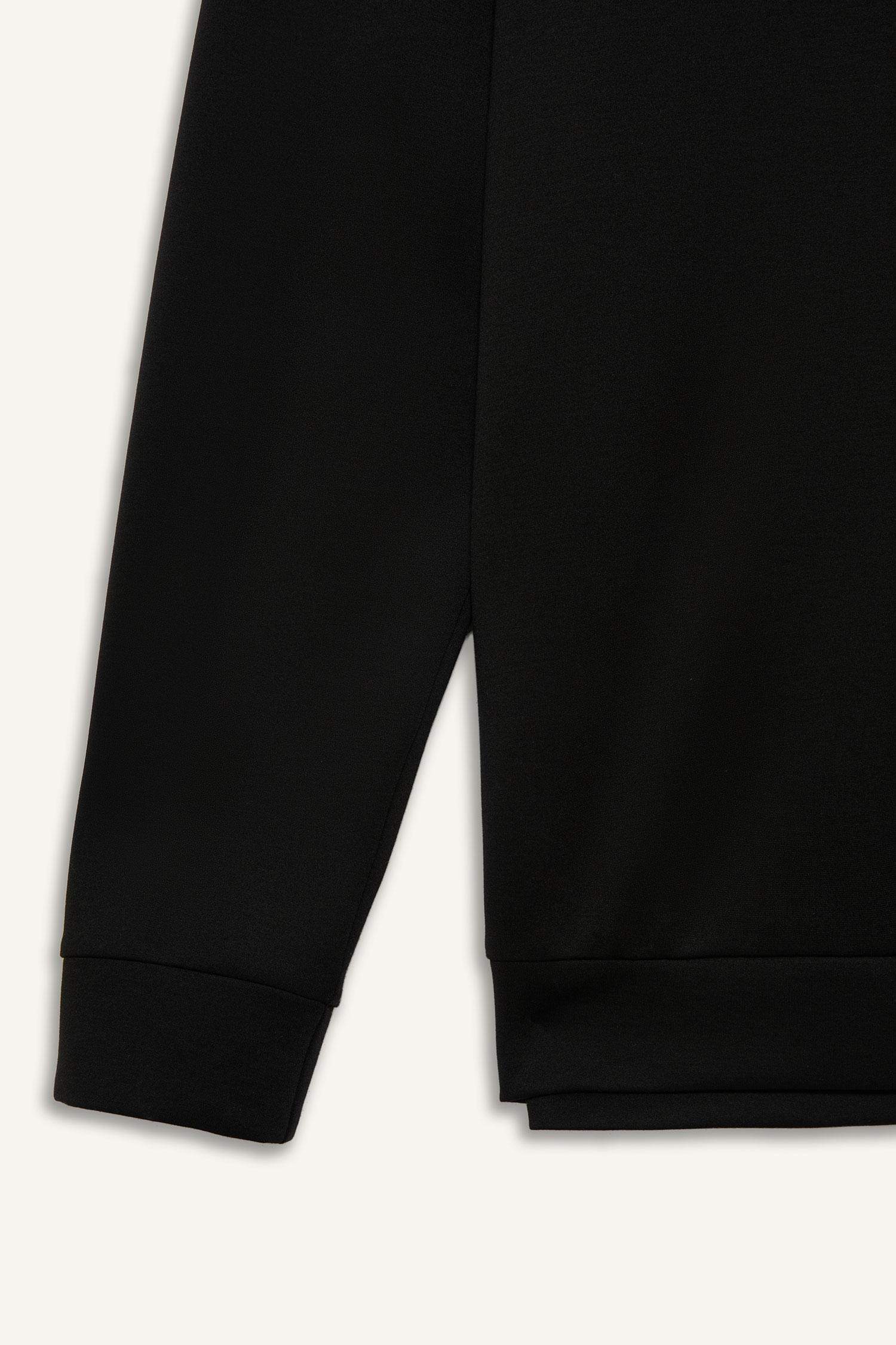 سويت شيرت رياضي قصة عادية من DeFactoFit