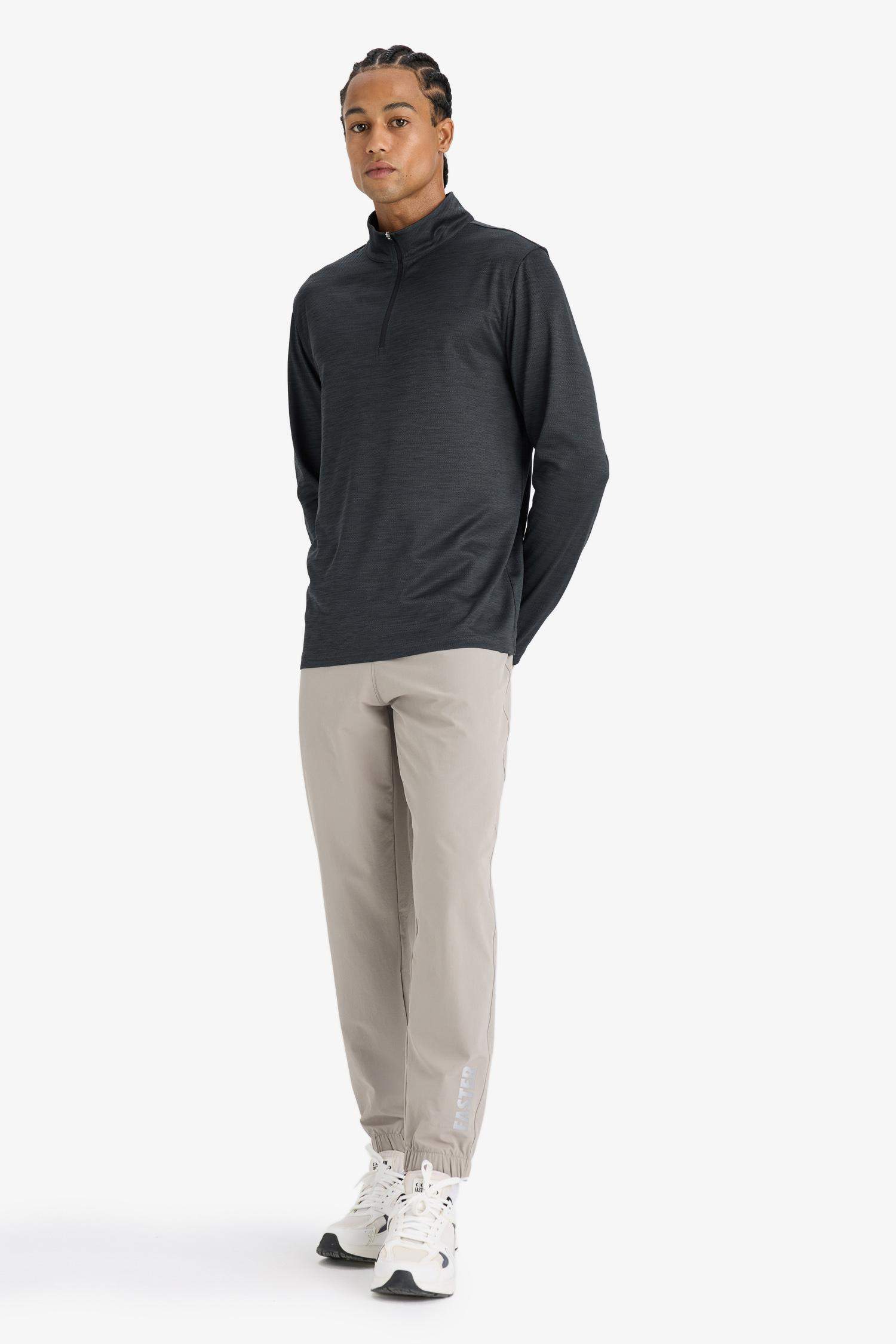 بنطلون بجامة رياضي جوجر منسوج سليم فيت من DeFactoFit