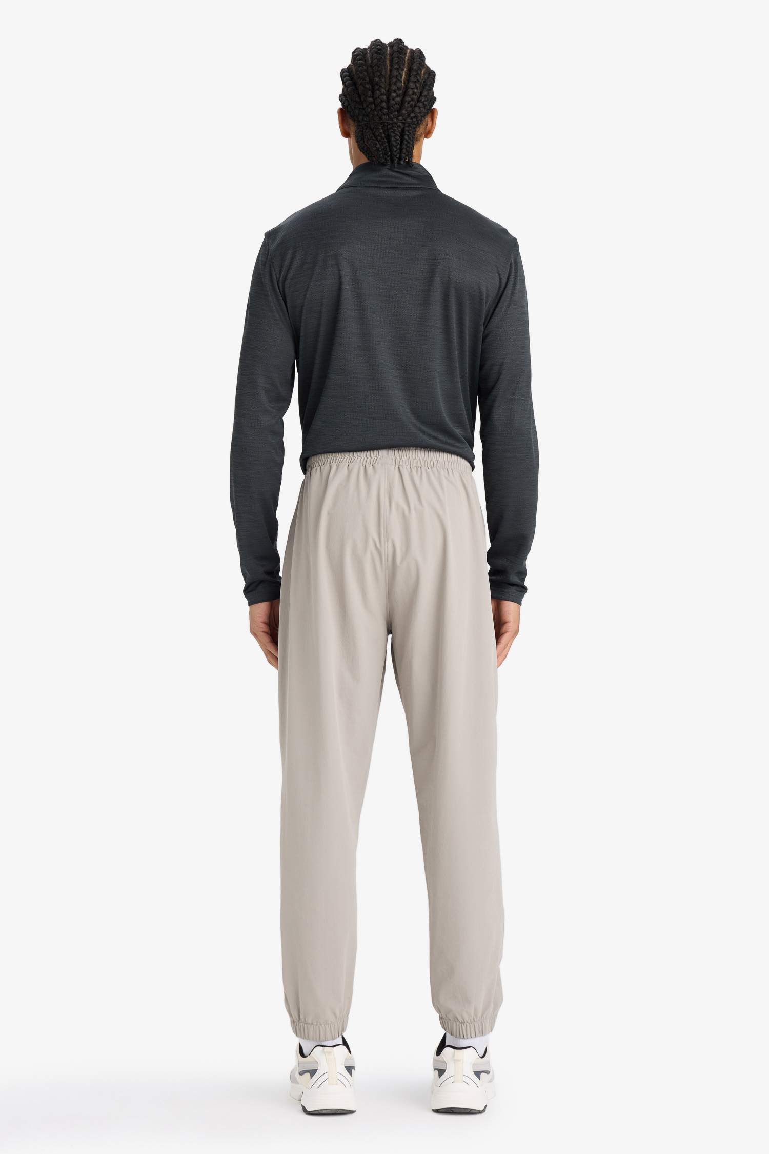 بنطلون بجامة رياضي جوجر منسوج سليم فيت من DeFactoFit