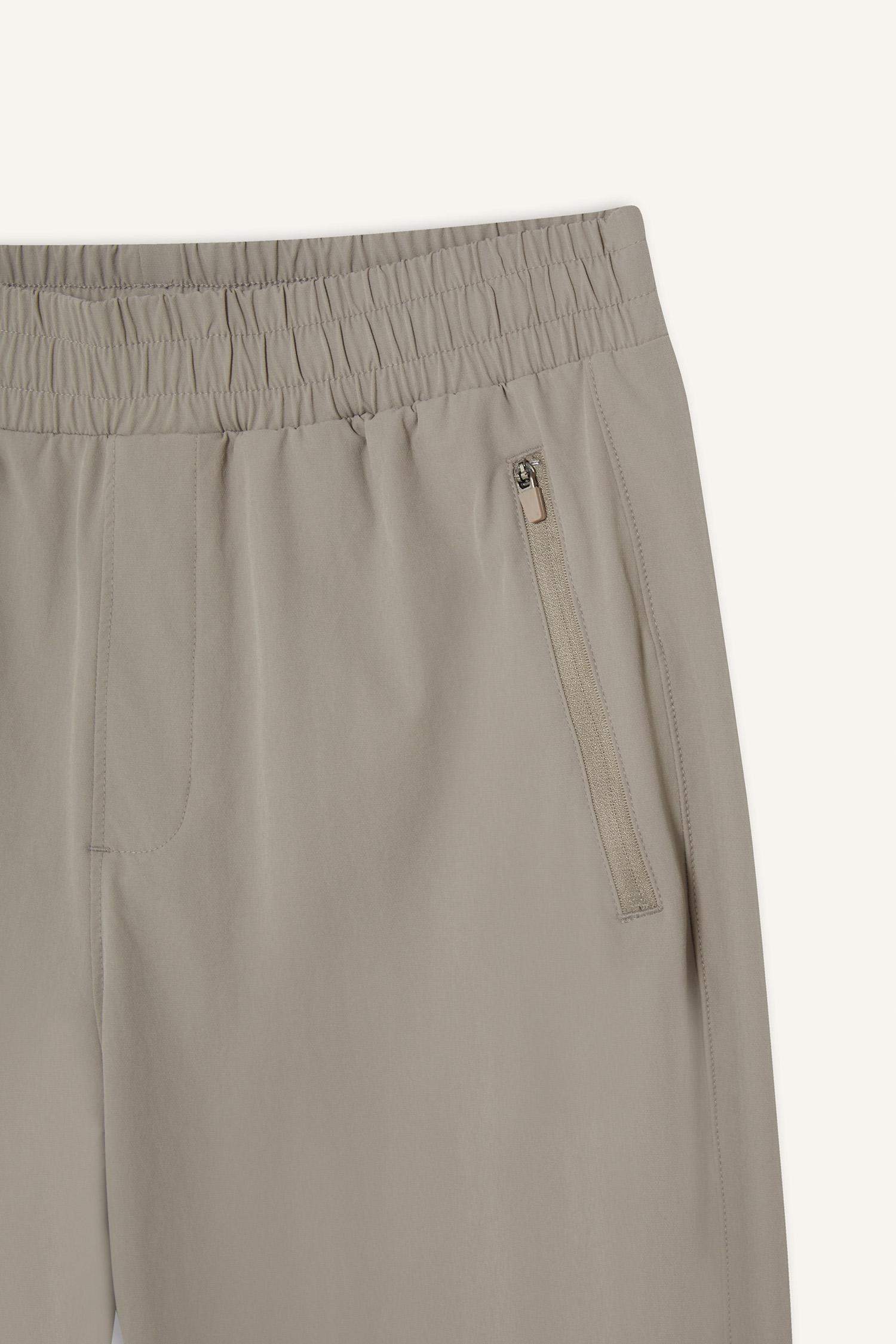 بنطلون بجامة رياضي جوجر منسوج سليم فيت من DeFactoFit