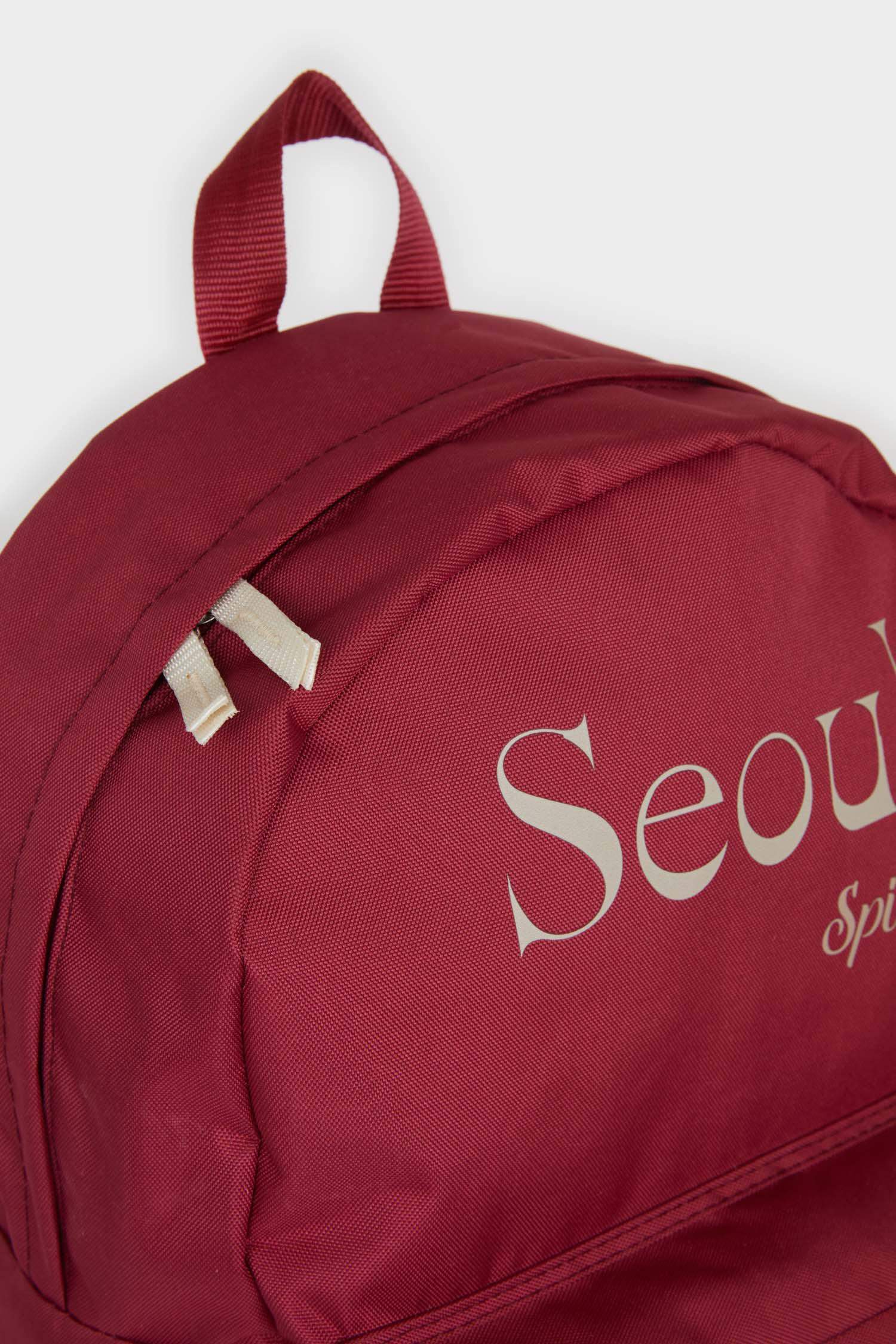 شنطة ظهر حريمي أحمر