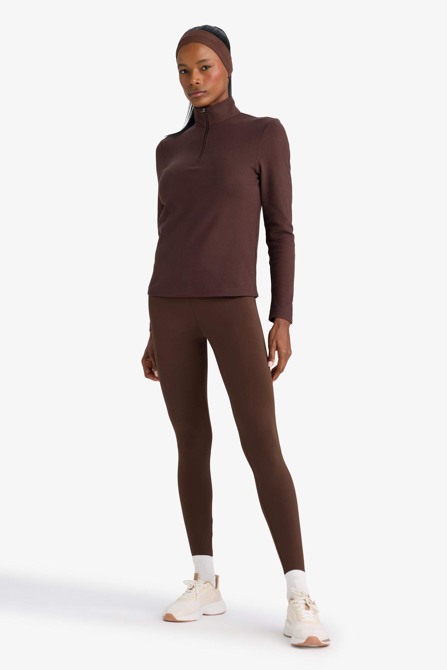 سويت شيرت رياضي قصة عادية بياخة عالية من DeFactoFit