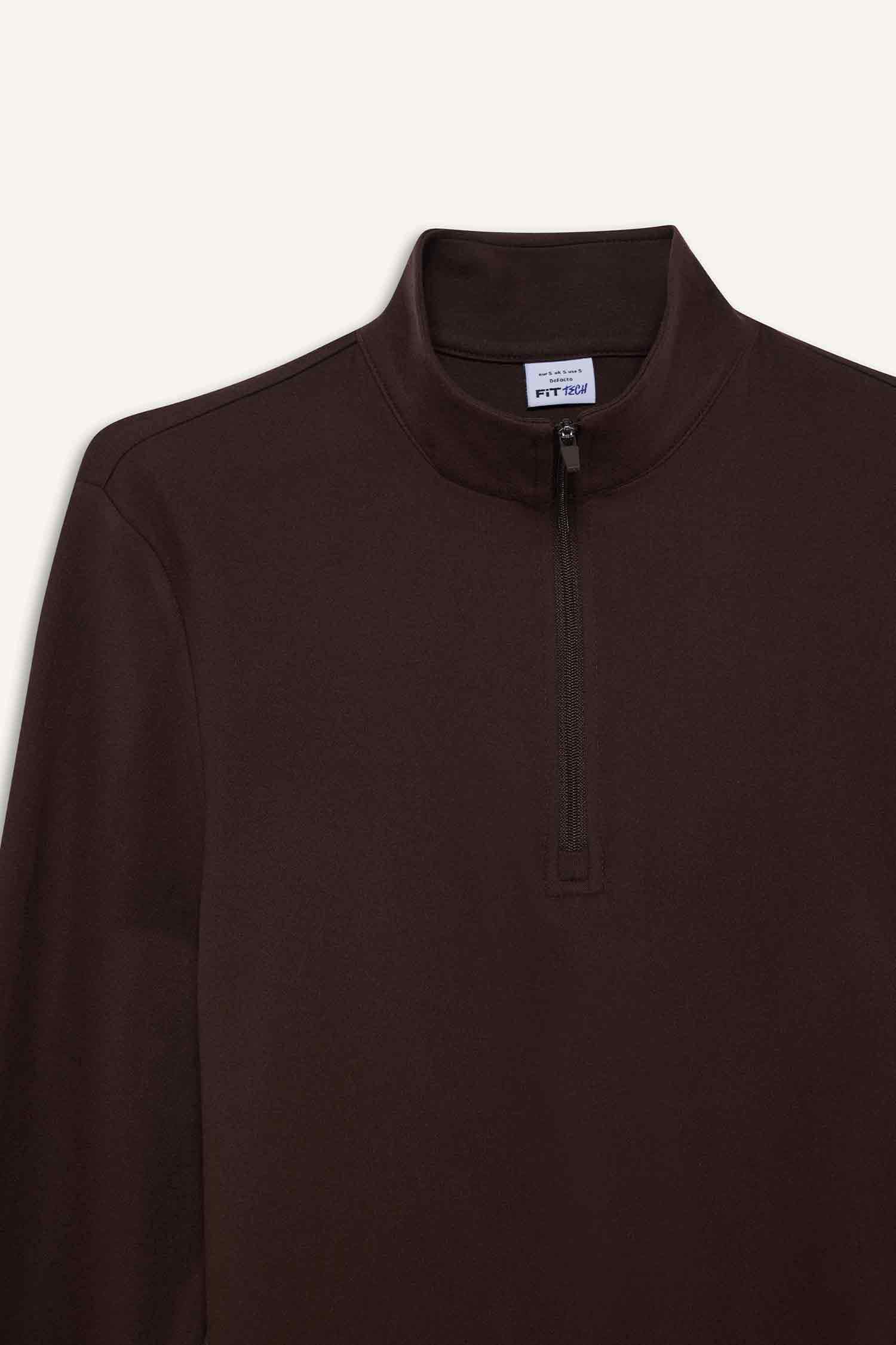 سويت شيرت رياضي قصة عادية بياخة عالية من DeFactoFit