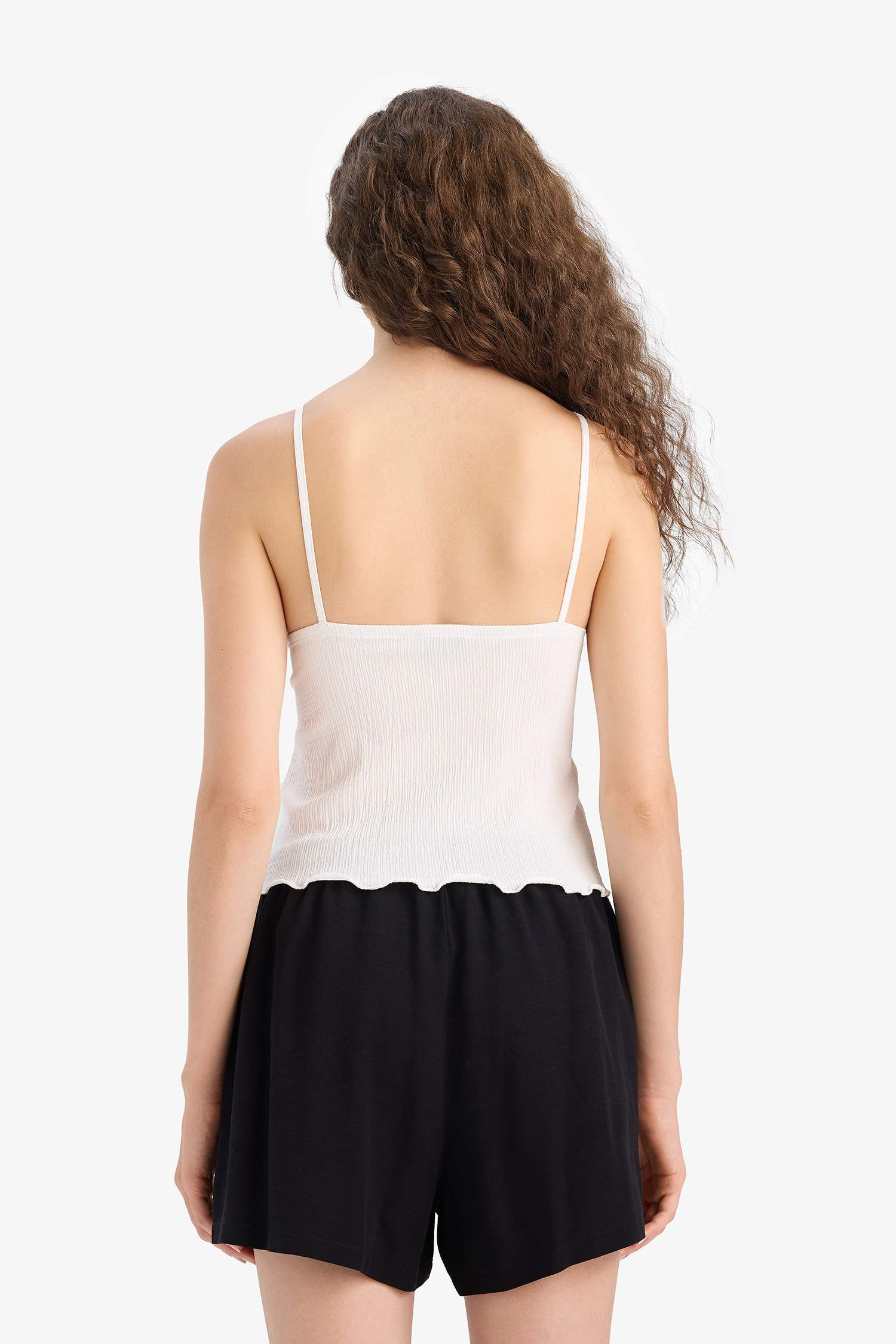 بلوزة قصة فضفاضة بياقة V وحمالات