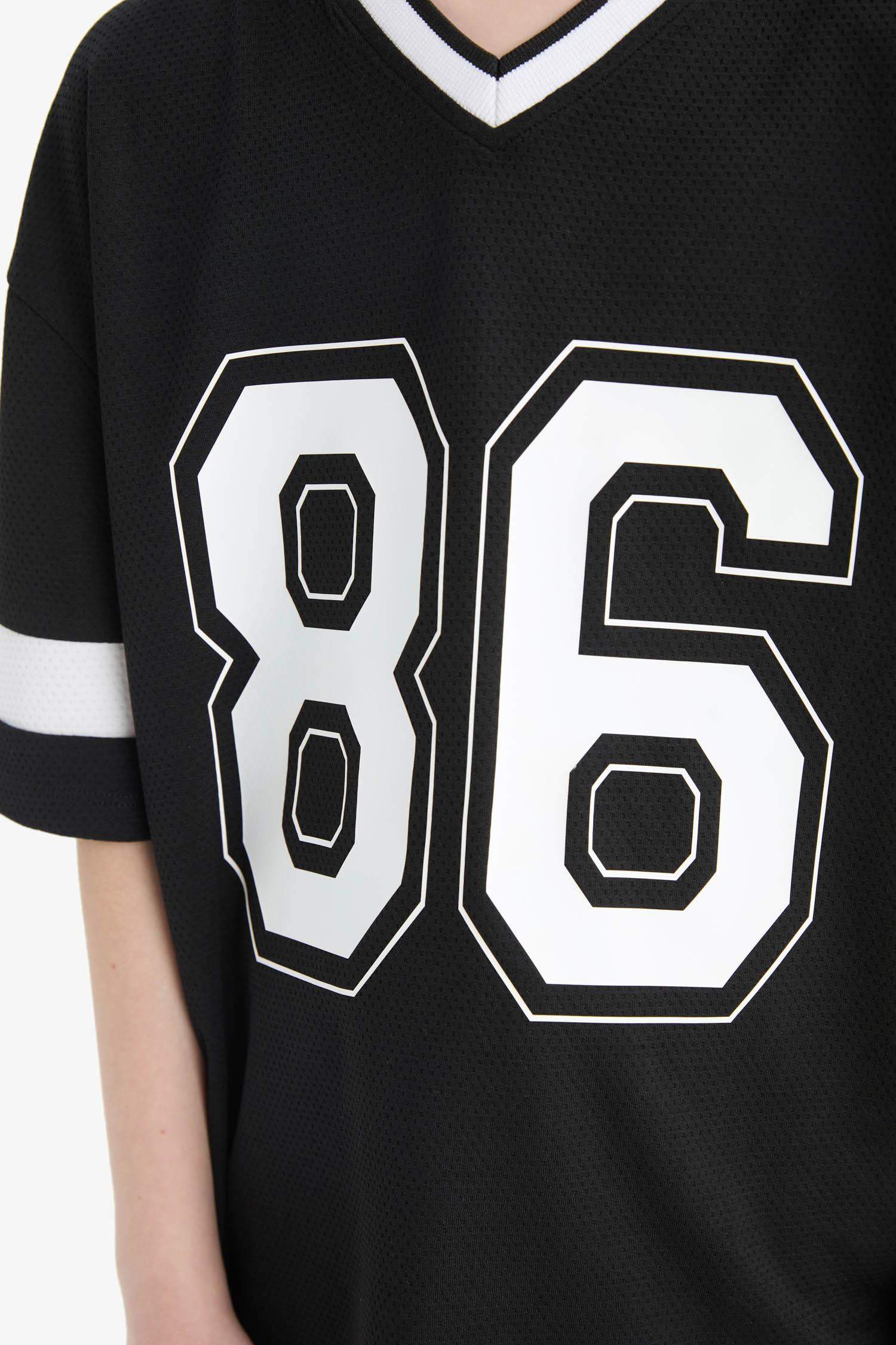 T-shirt oversize imprimé à col V et manches courtes pour garçon