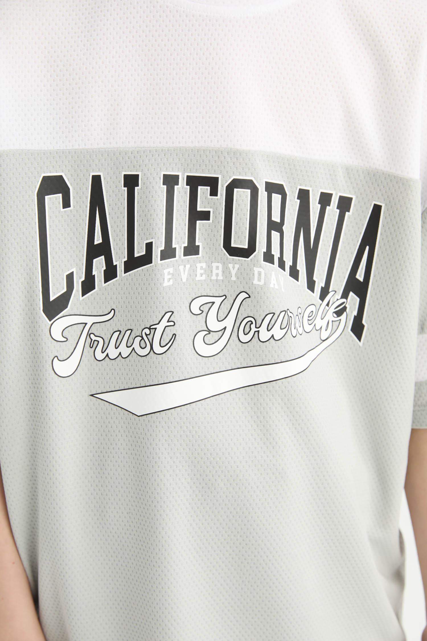 تيشيرت ولادي نص ردن اوفر سايز بياخة مستديرة ملون