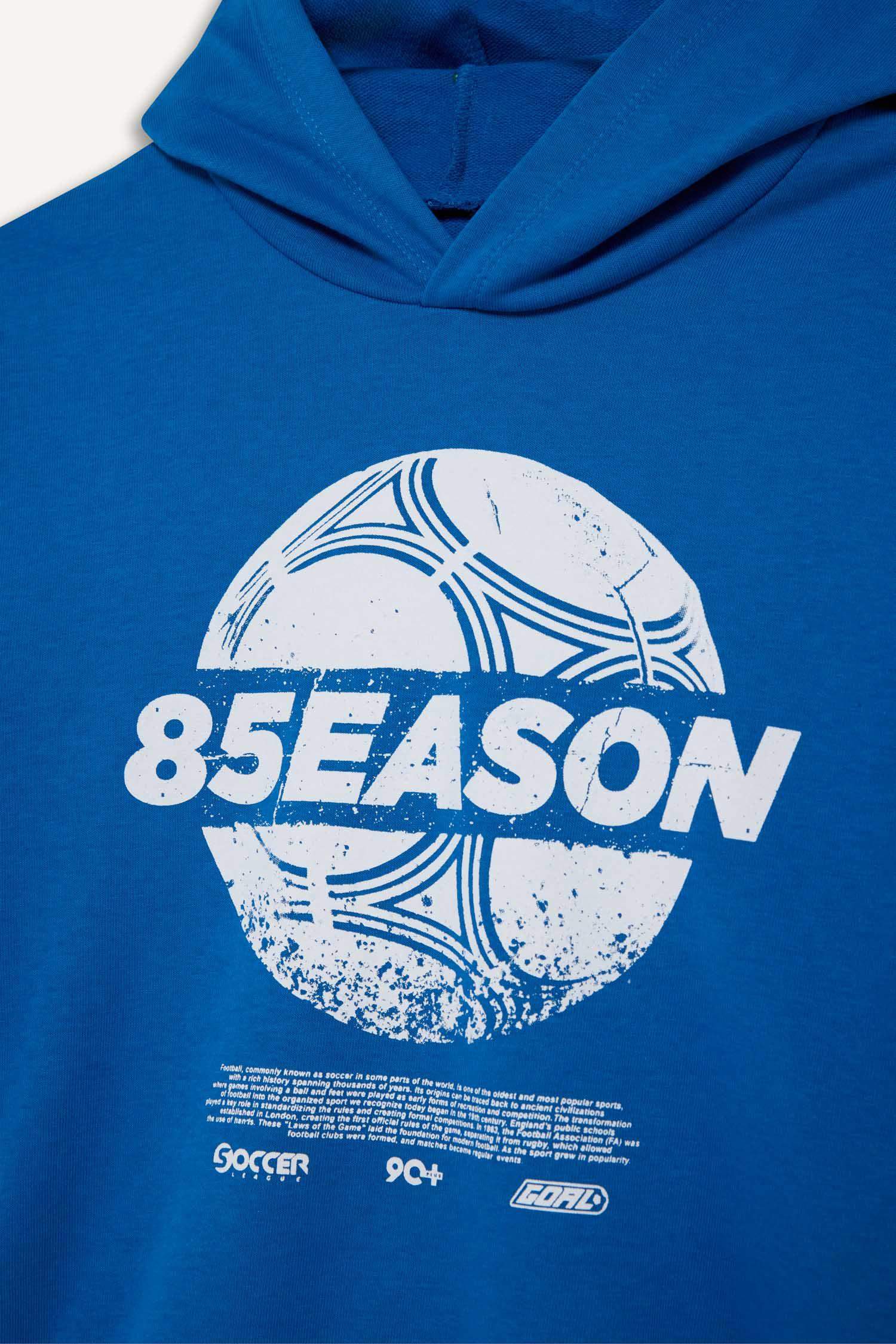 سويت شيرت اولادي قصة عادية بكابيشون أزرق فاقع