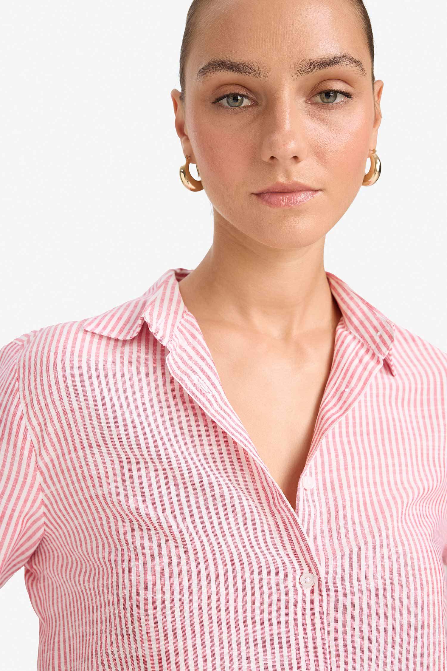 قميص كم طويل بينك قصة عادية