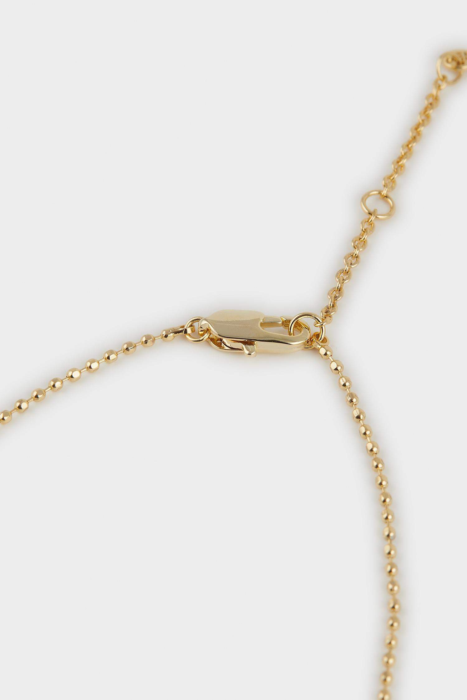 سيت قلادة وتراجي نسائي ذهبي - قطعتين من Reis x DeFacto