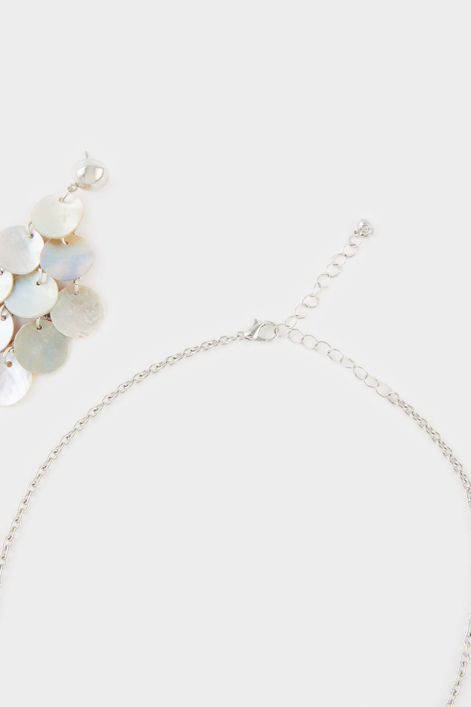 سيت تراجي وقلادة نسائي فضي - قطعتين