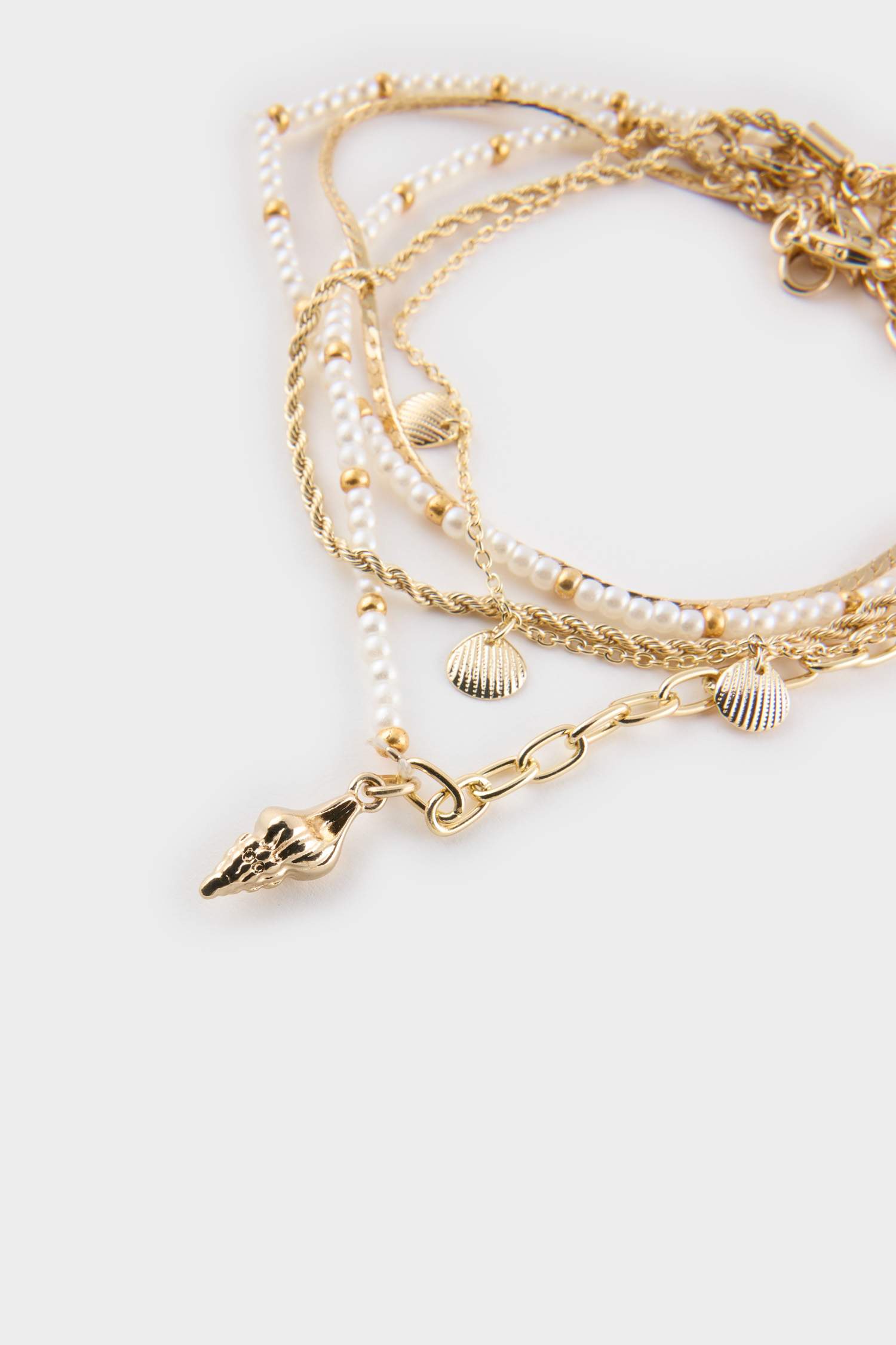 طقم 5 أساور كاحل ذهبية نسائي