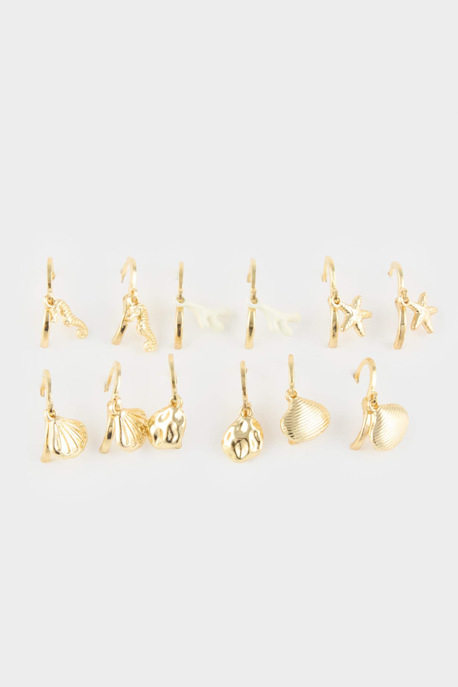 Woman 9 Piece Sea Themed Gold Earrings