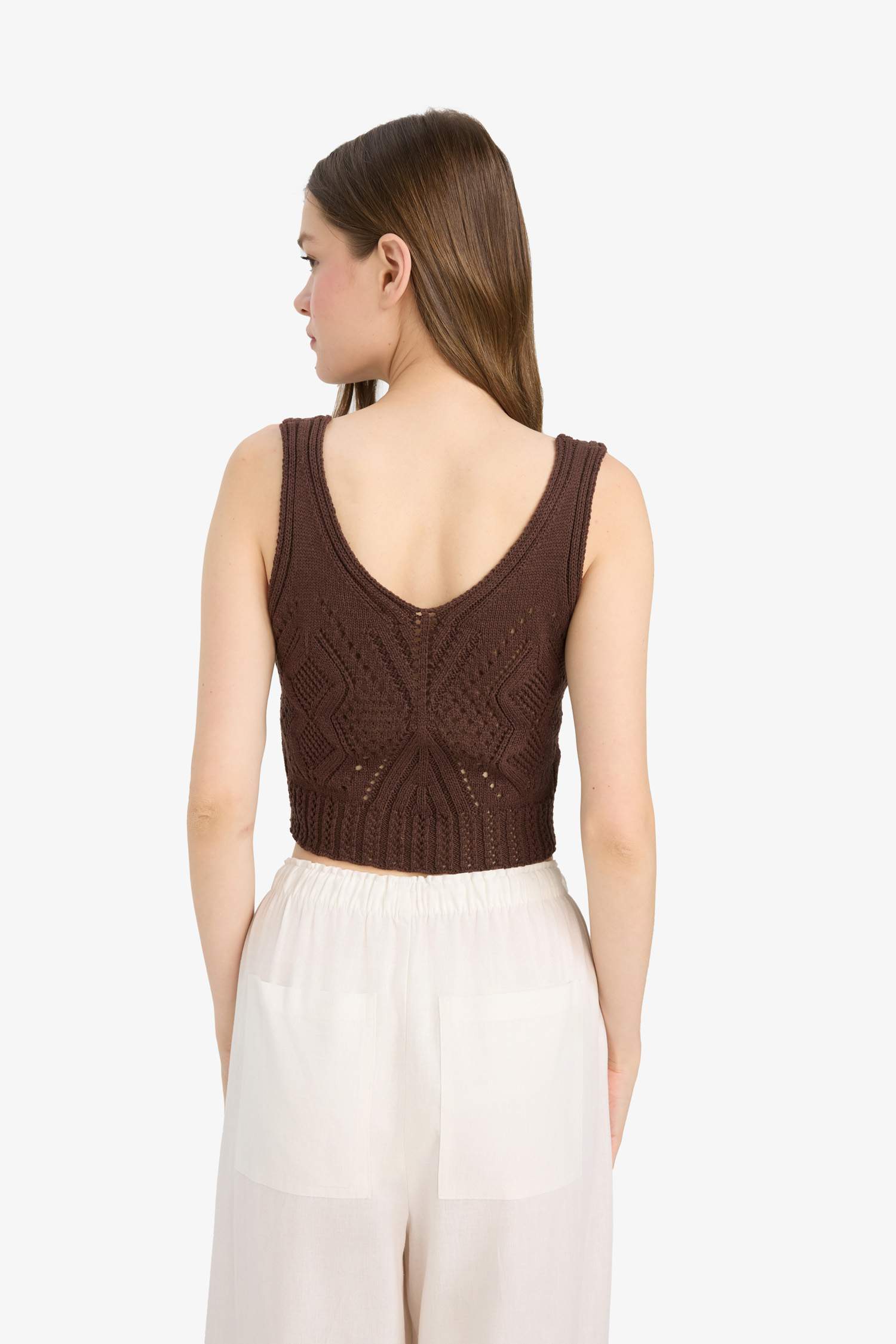 Top à bretelles slim en crochet Col V