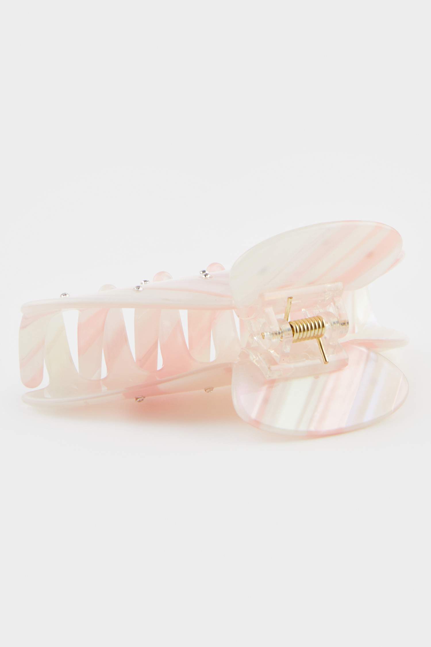 Pince à cheveux dorée effet nacré pour femme