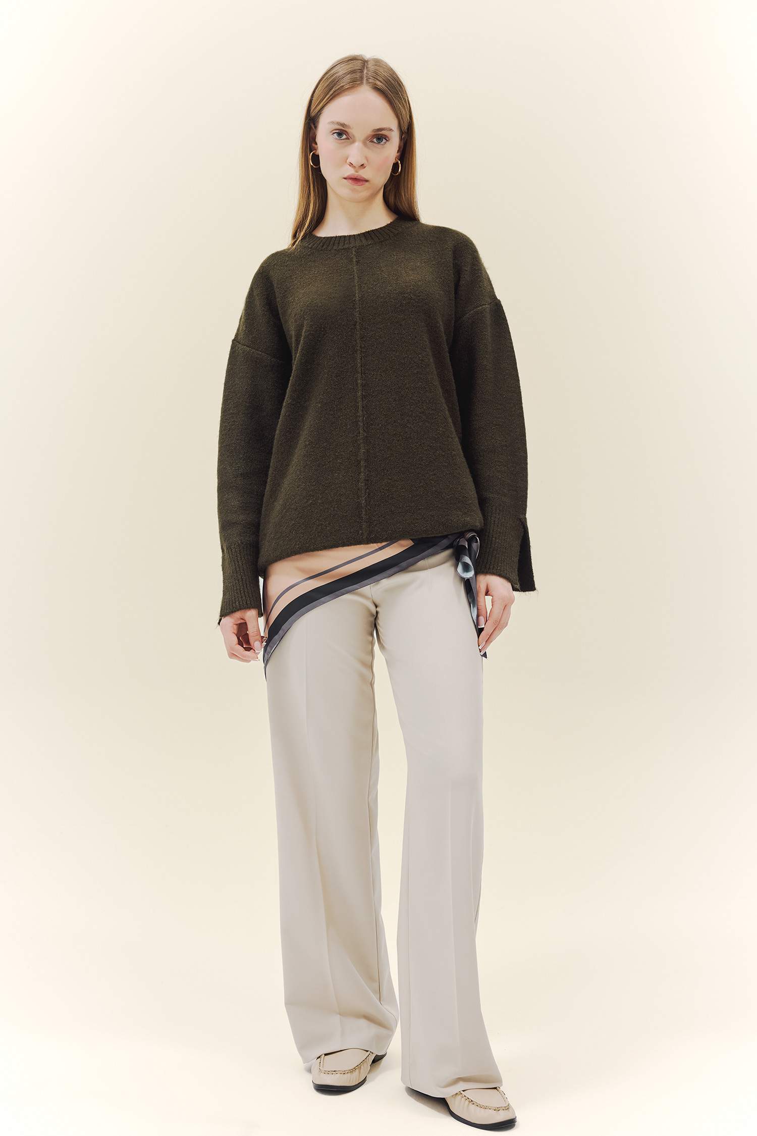 بلوز تريكو قصة فضفاضة بياخة مستديرة