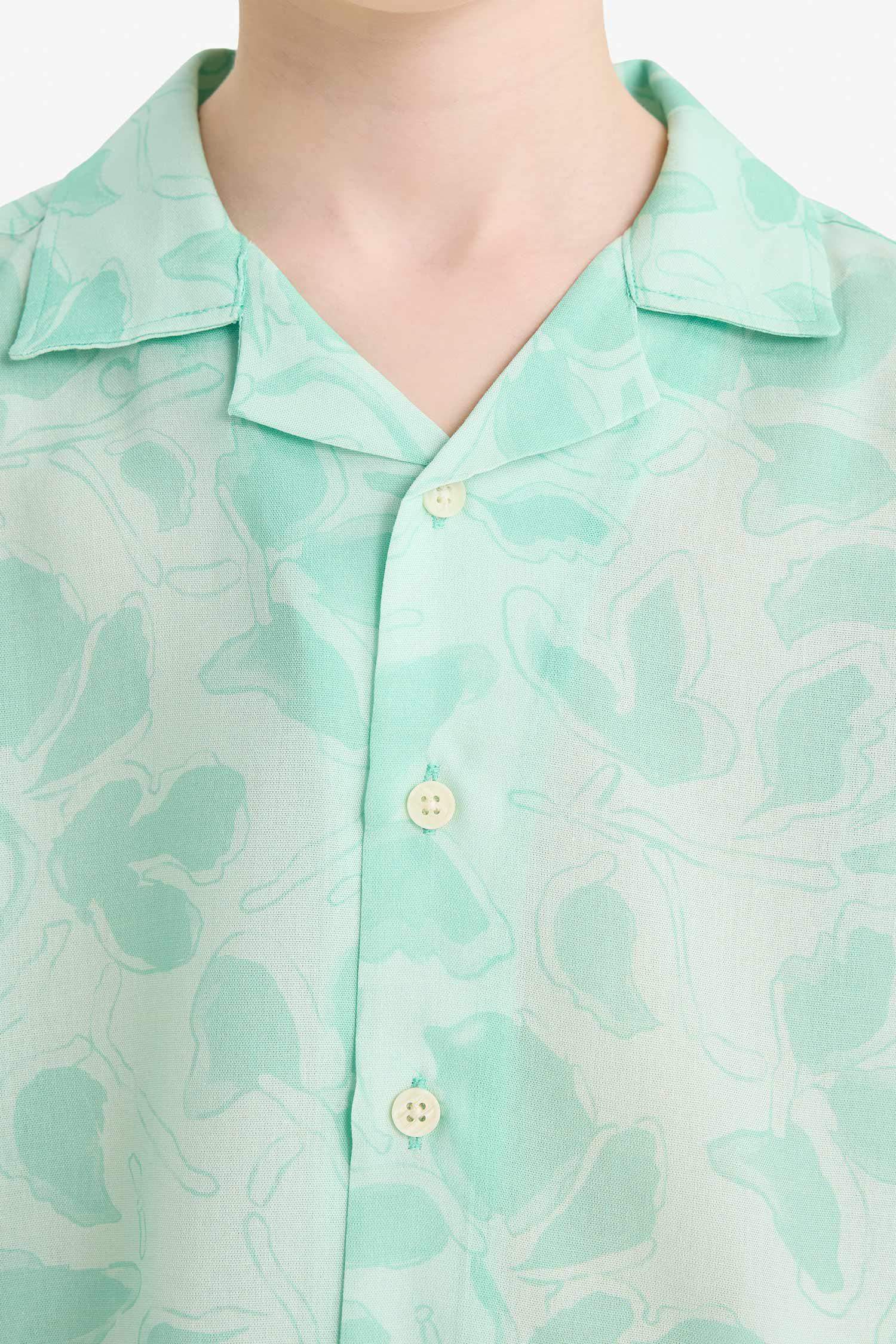 قميص نص ردن ولادي اوفر سايز فلورال فيسكوز