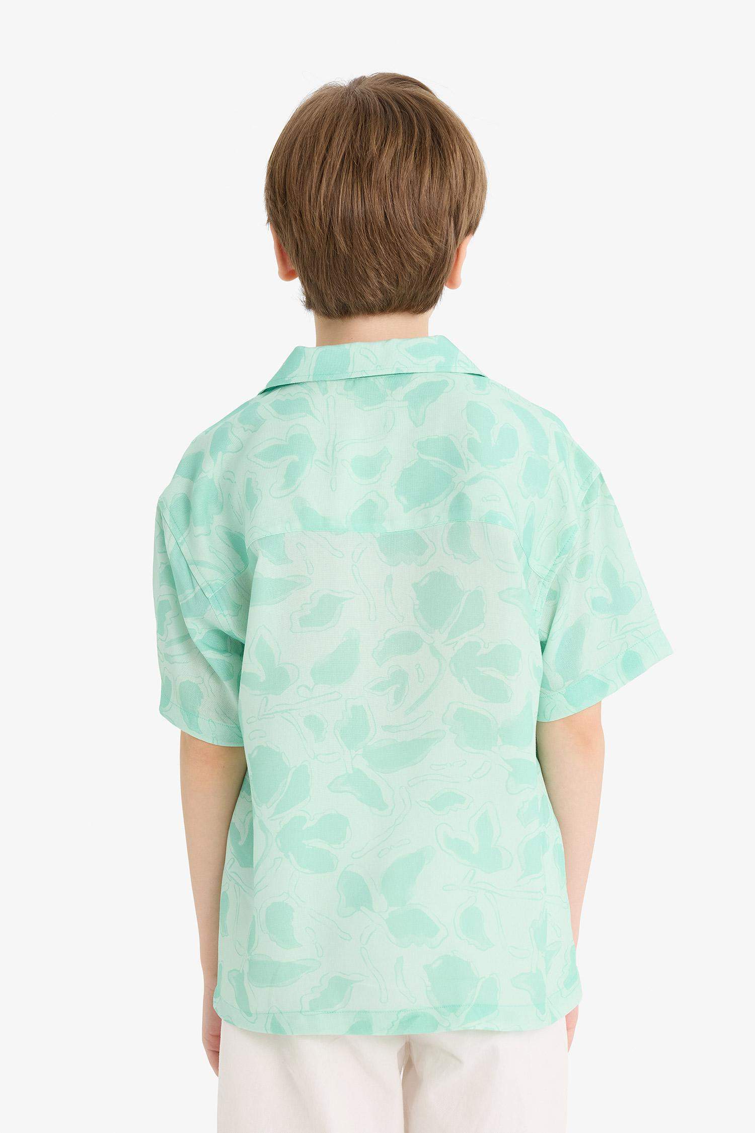 قميص نص ردن ولادي اوفر سايز فلورال فيسكوز