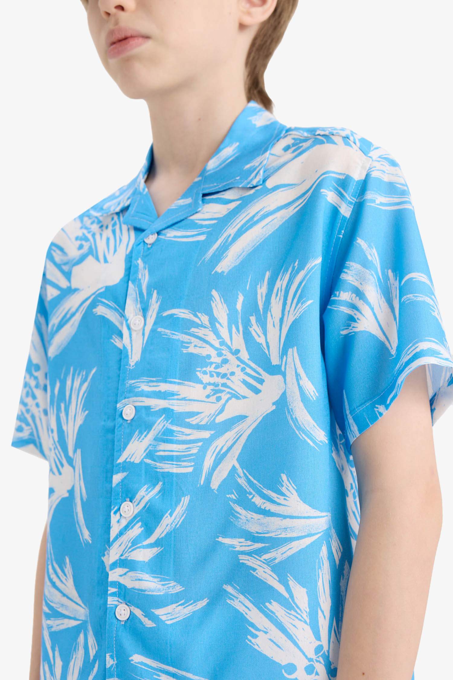 قميص نص ردن ولادي اوفر سايز فلورال فيسكوز