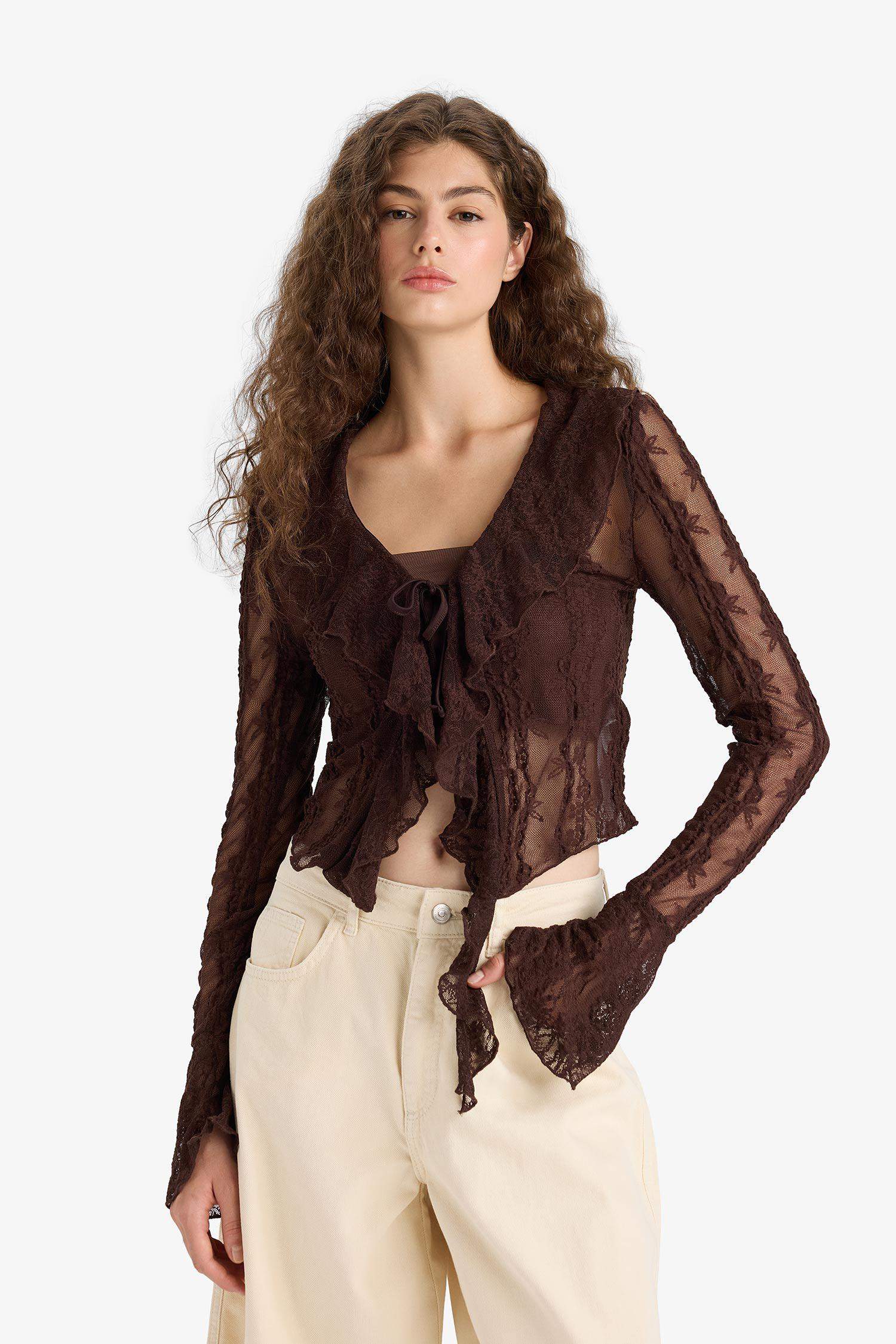 Blouse slim en dentelle à col V et manches longues