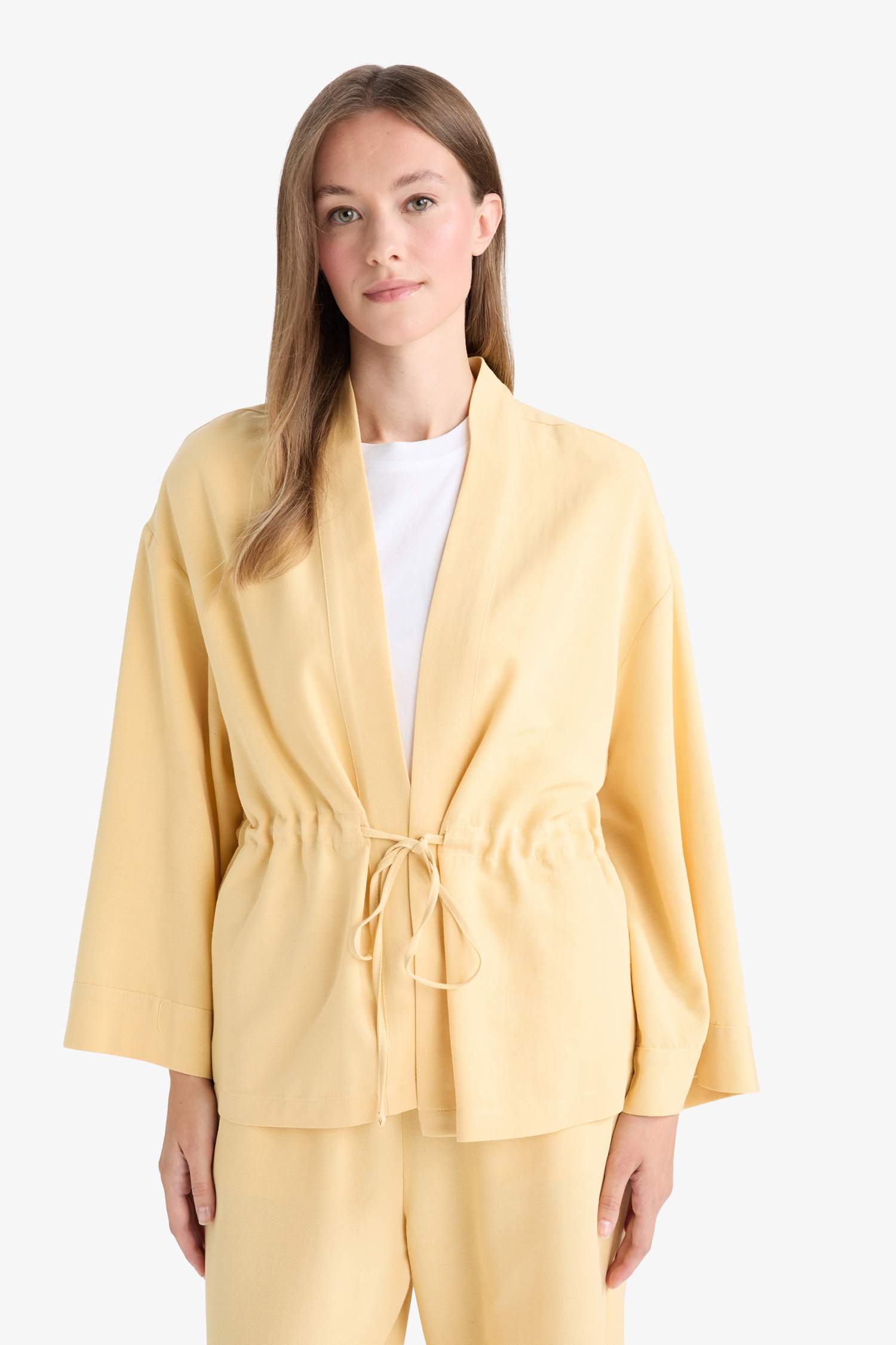 Удлинённая рубашка-блузка с разрезом и длинными рукавами