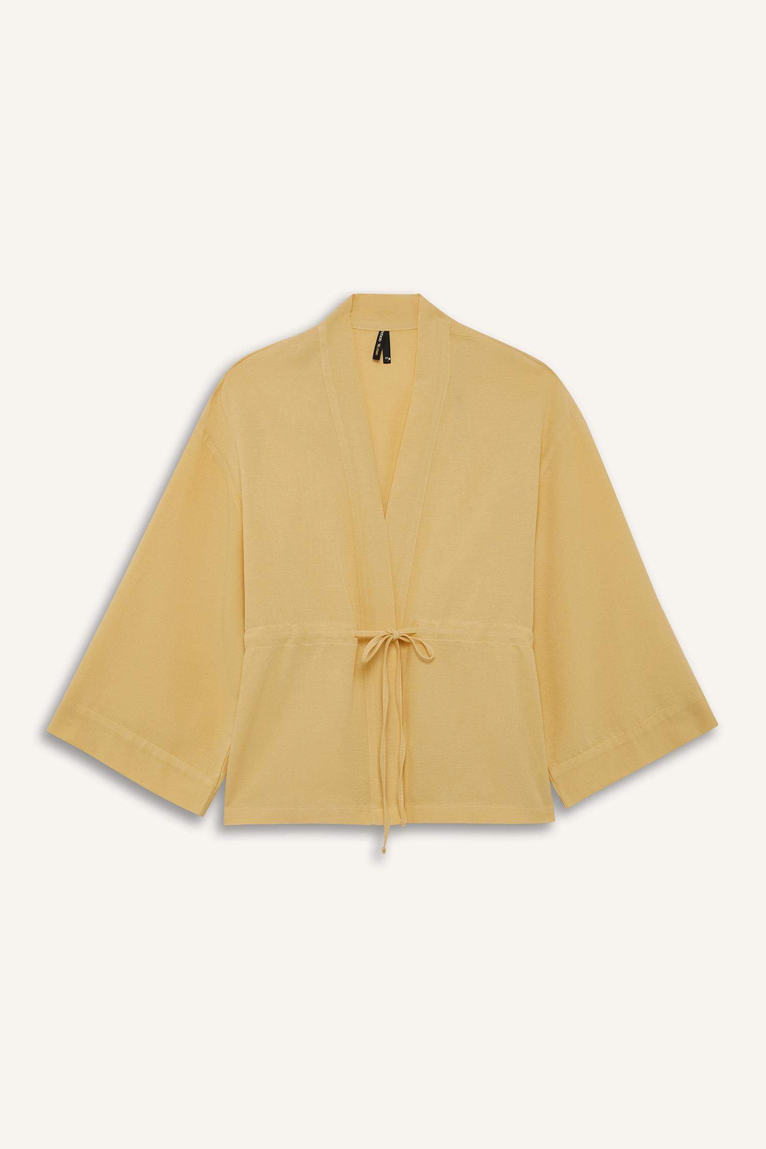 Удлинённая рубашка-блузка с разрезом и длинными рукавами