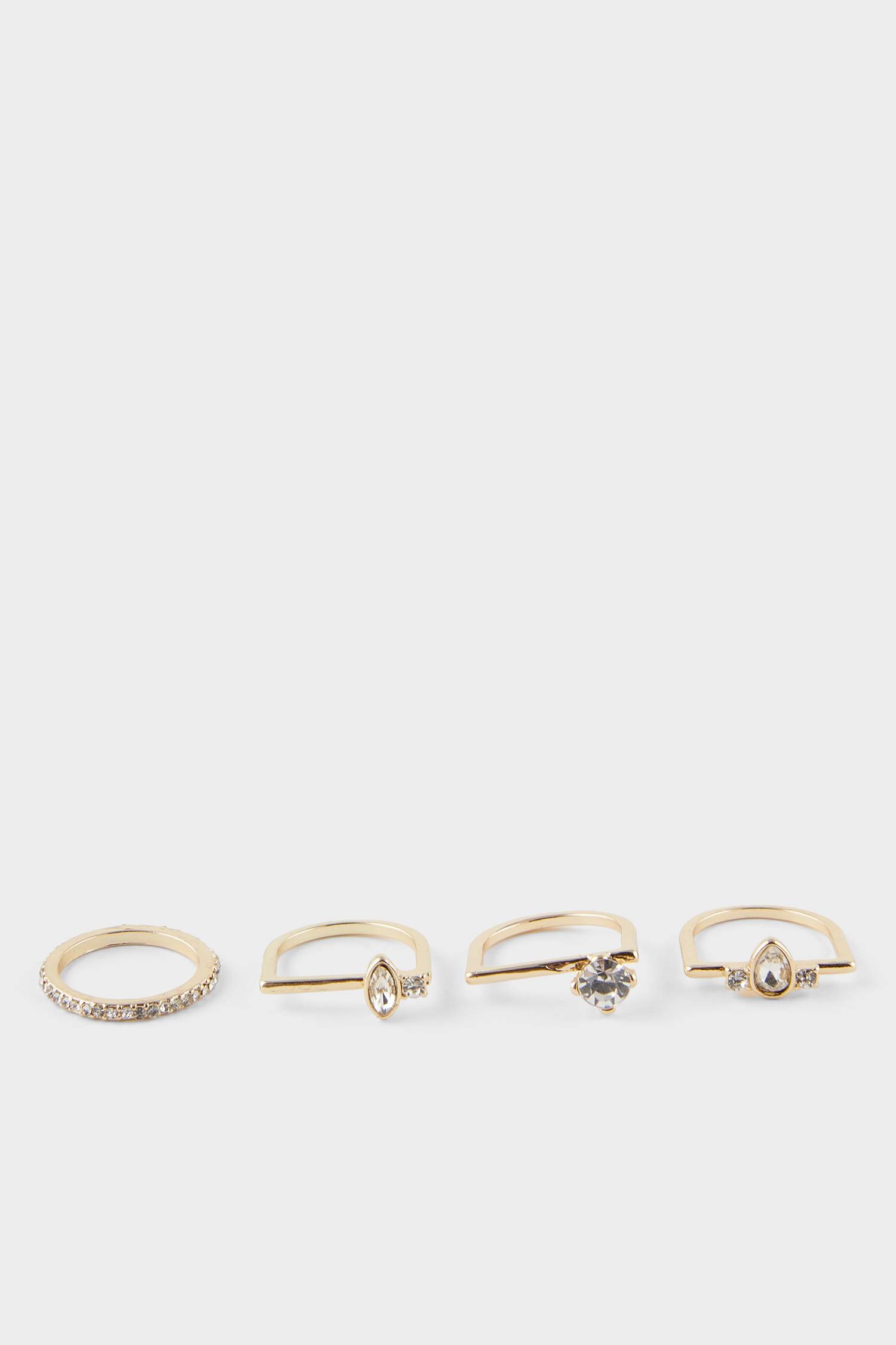 Woman 4 Piece Stoned Gold Rings