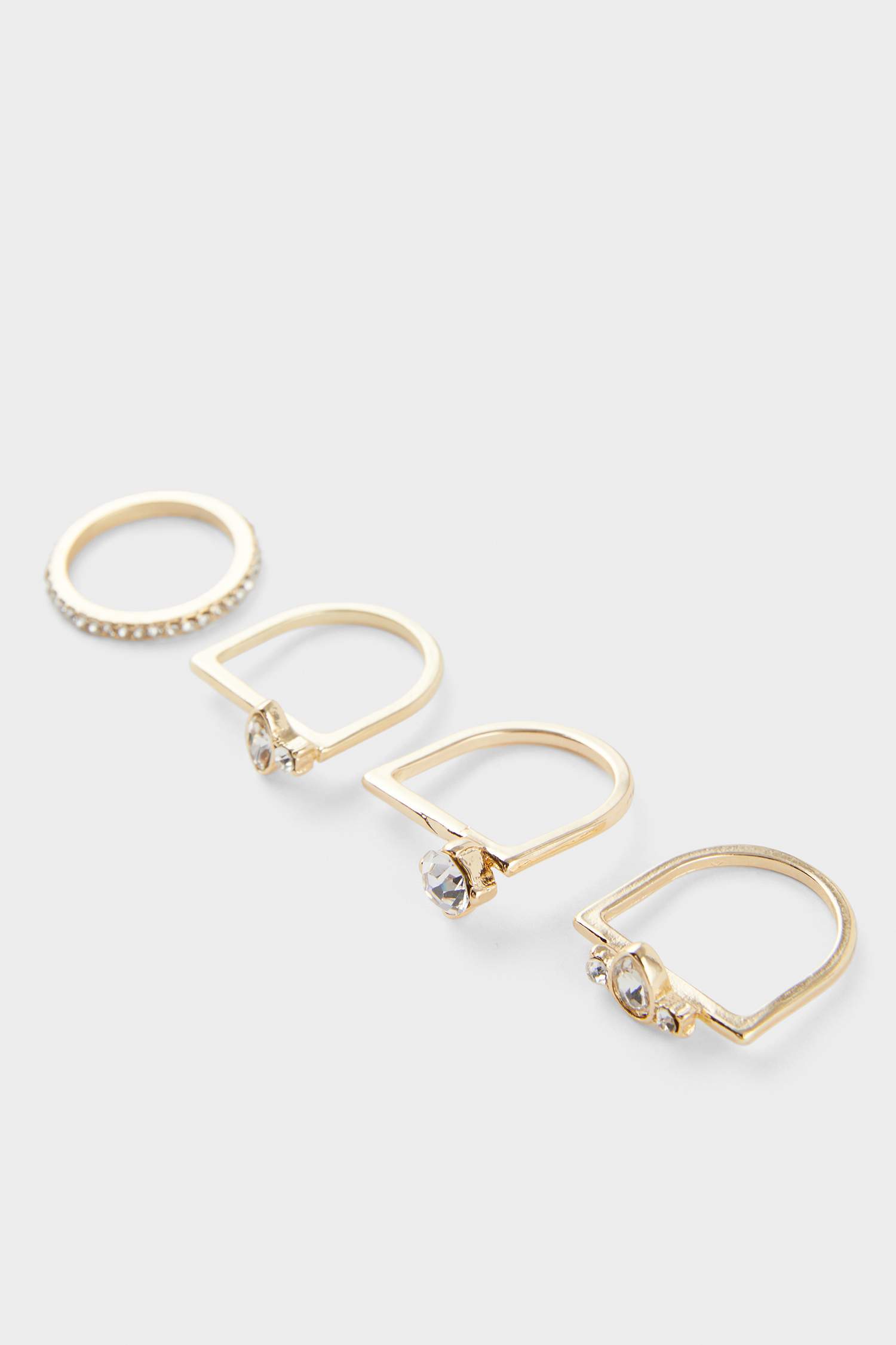 Woman 4 Piece Stoned Gold Rings