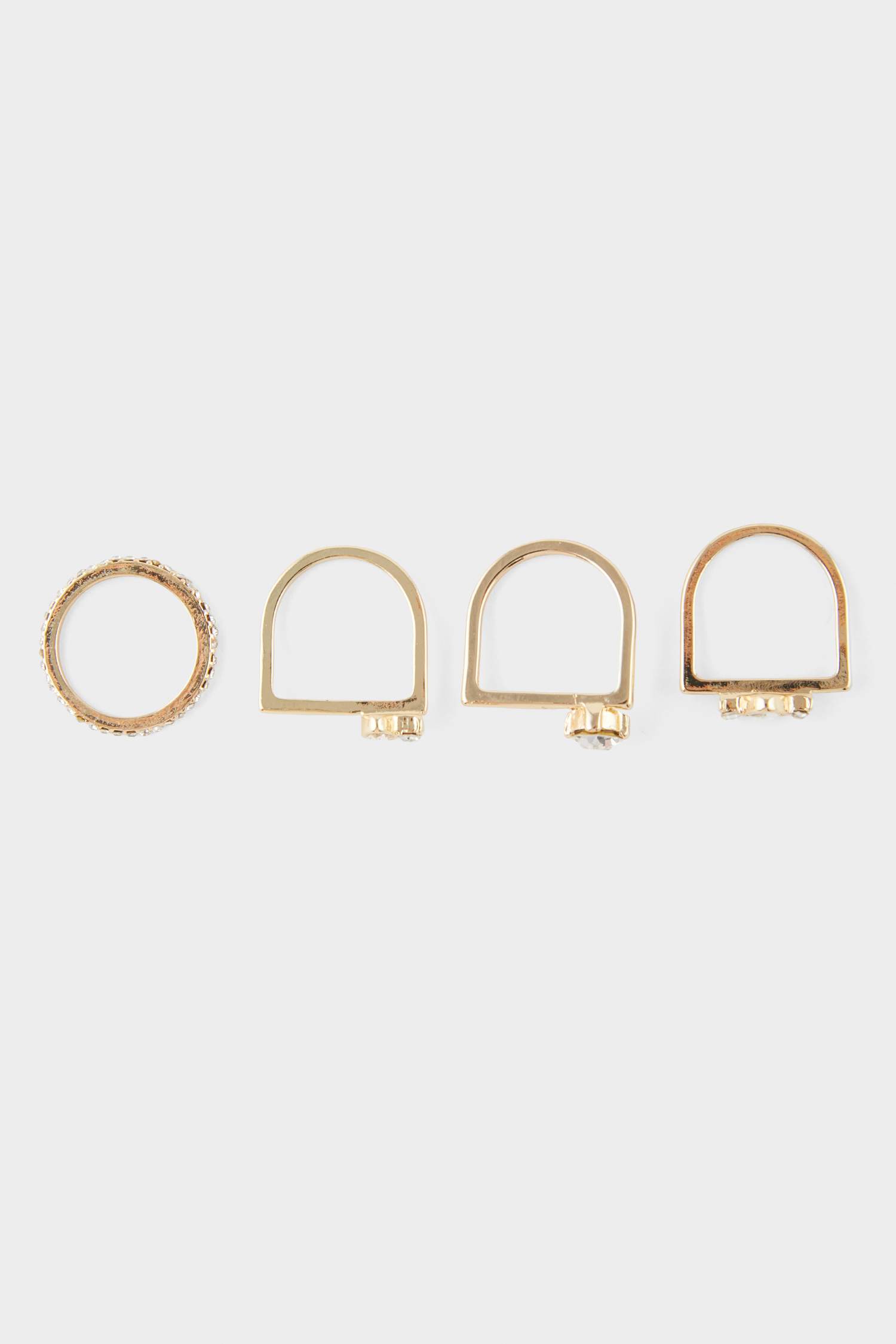 Woman 4 Piece Stoned Gold Rings