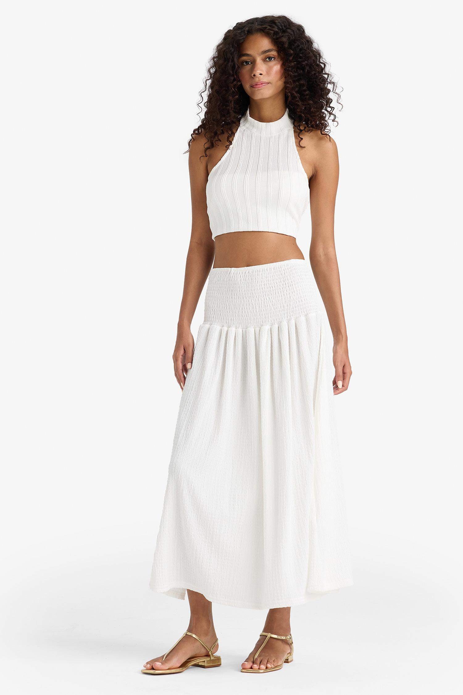 Белая макси-юбка А-силуэта с высокой талией и рюшами
