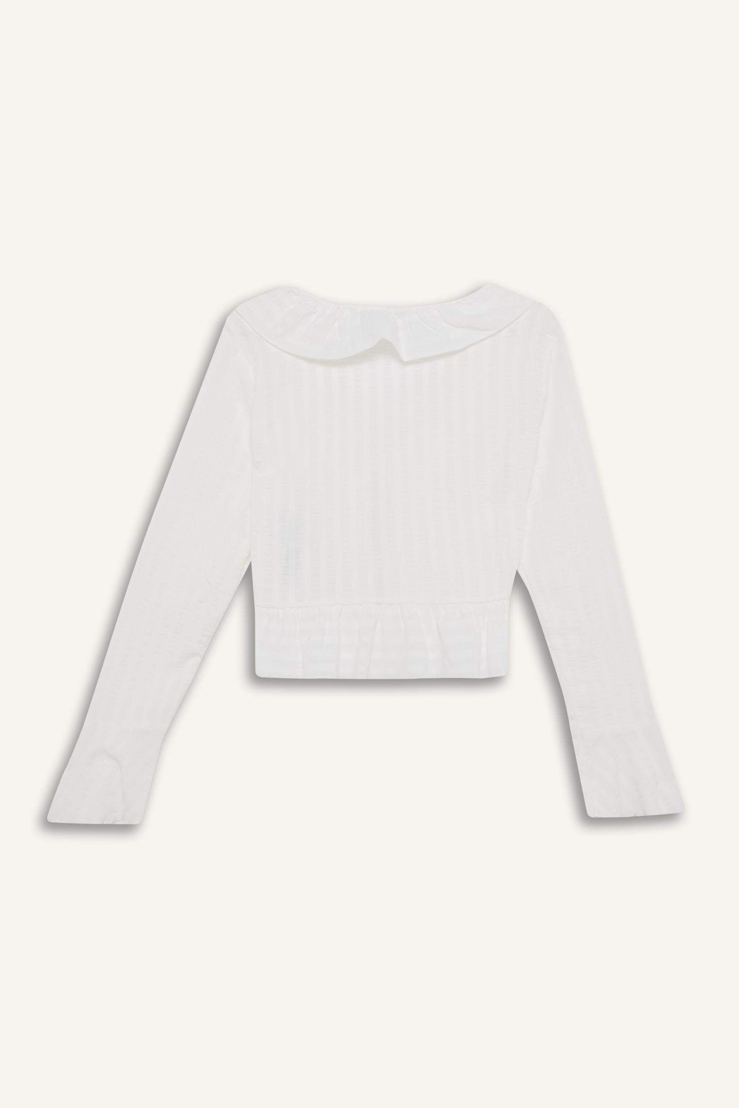 Blouse texturée à manches longues avec noeuds et volants Coupe régulière