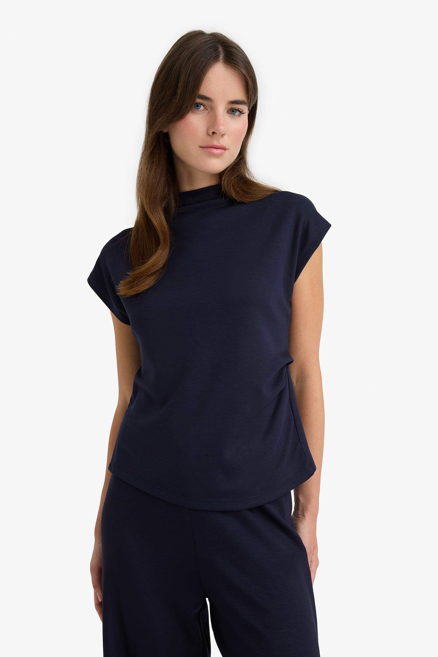 Top sans manches à col montant en piqué Coupe slim